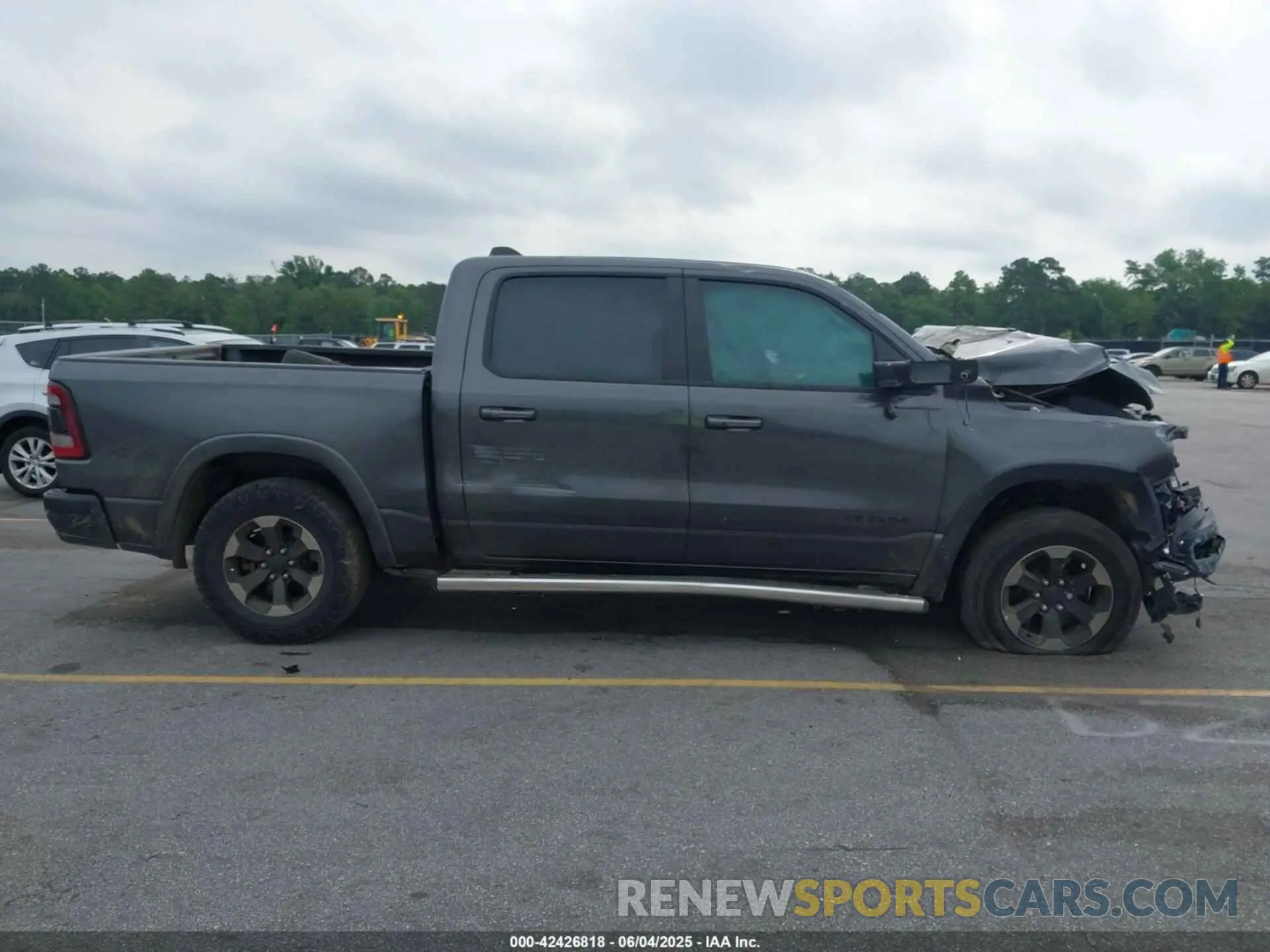 13 Photograph of a damaged car 1C6RRELT5KN625118 RAM 1500 2019