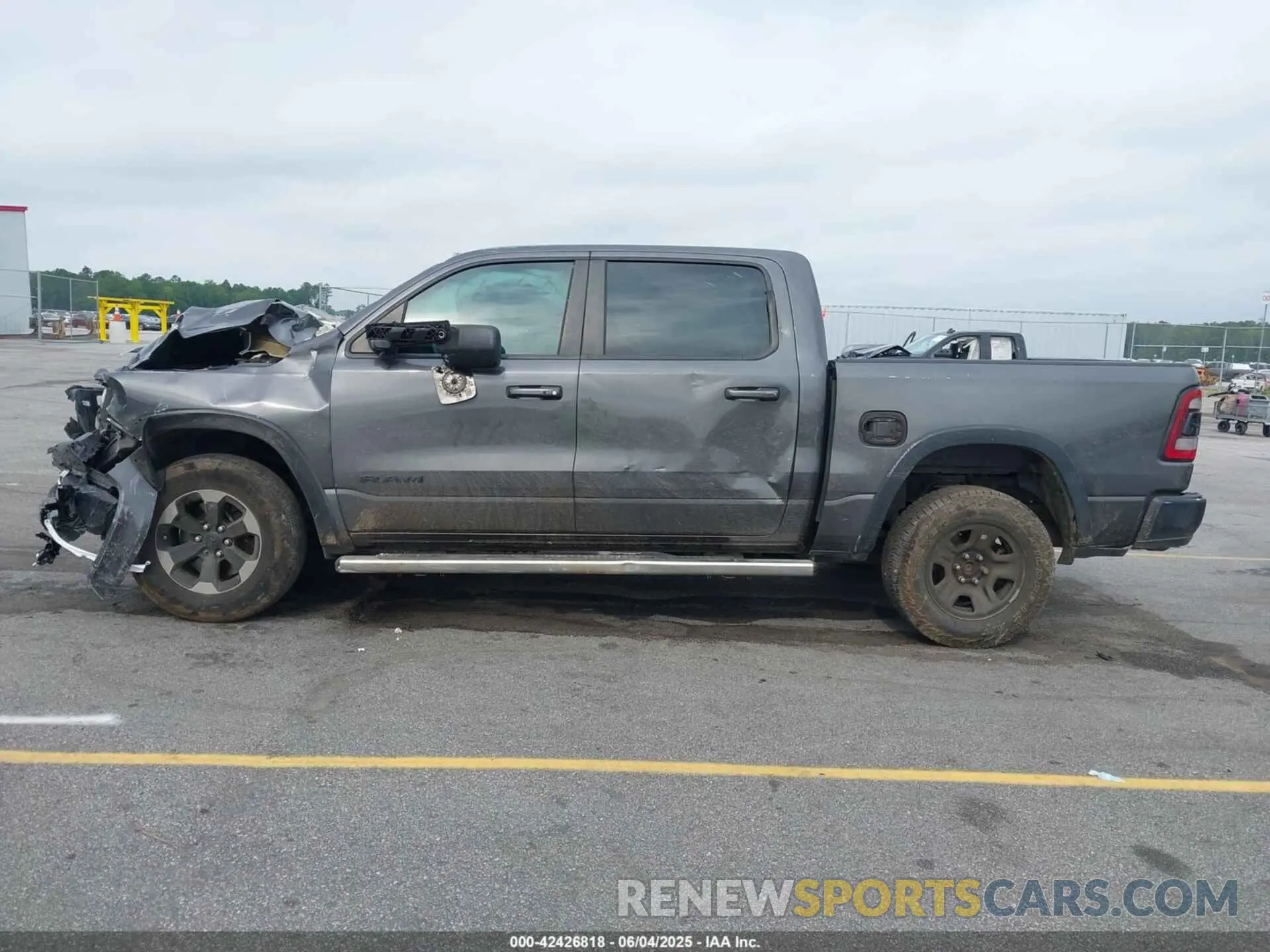 14 Photograph of a damaged car 1C6RRELT5KN625118 RAM 1500 2019
