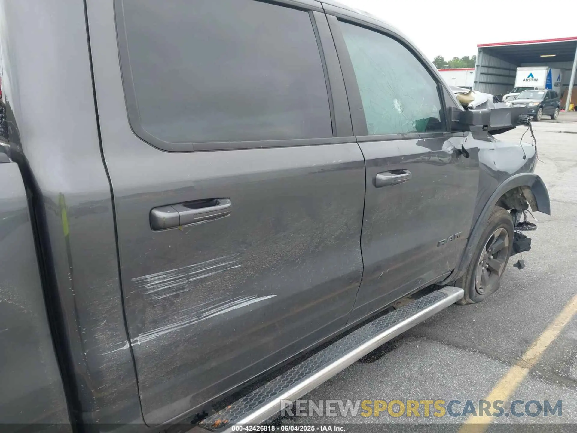 19 Photograph of a damaged car 1C6RRELT5KN625118 RAM 1500 2019