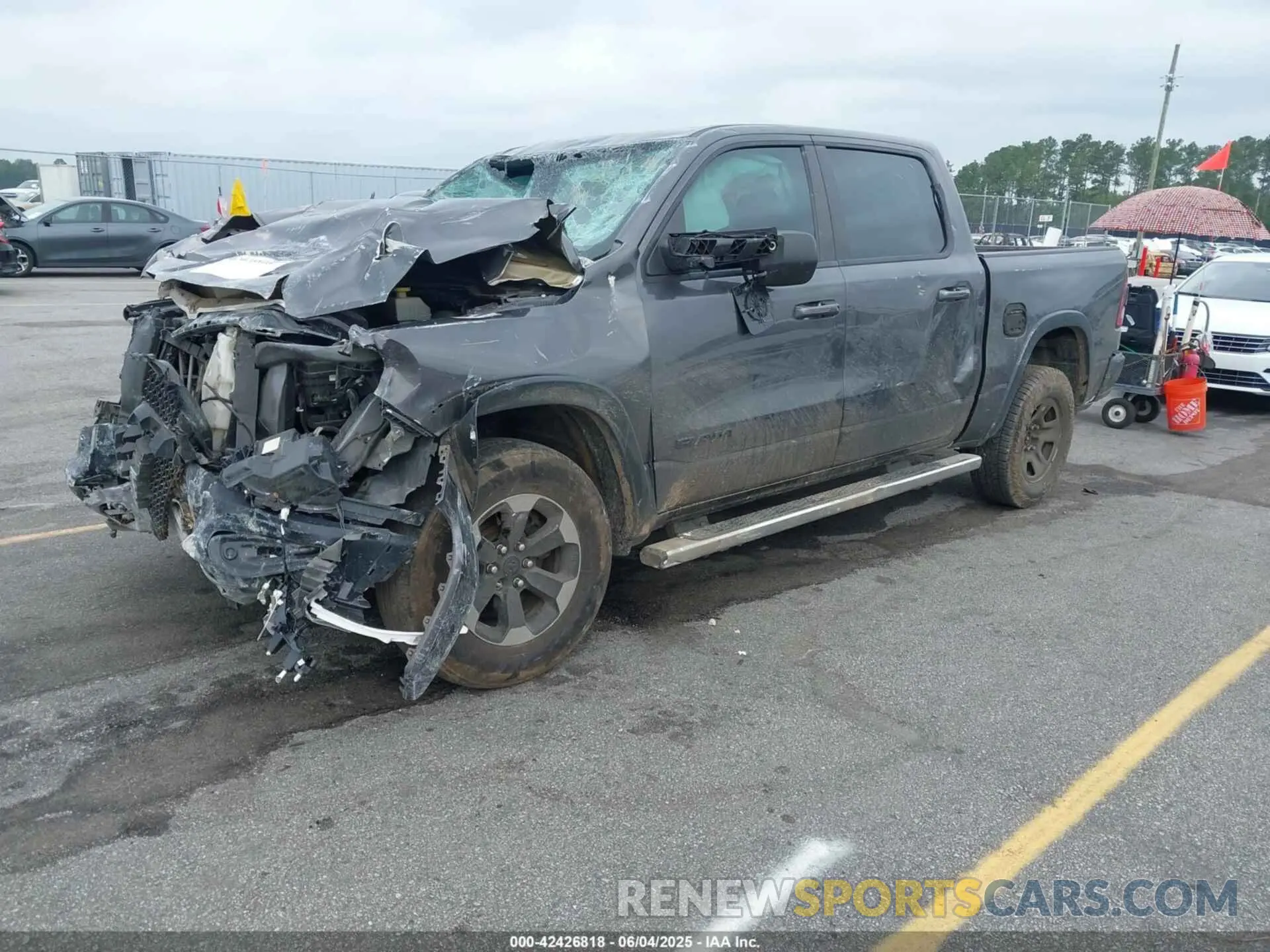 2 Photograph of a damaged car 1C6RRELT5KN625118 RAM 1500 2019