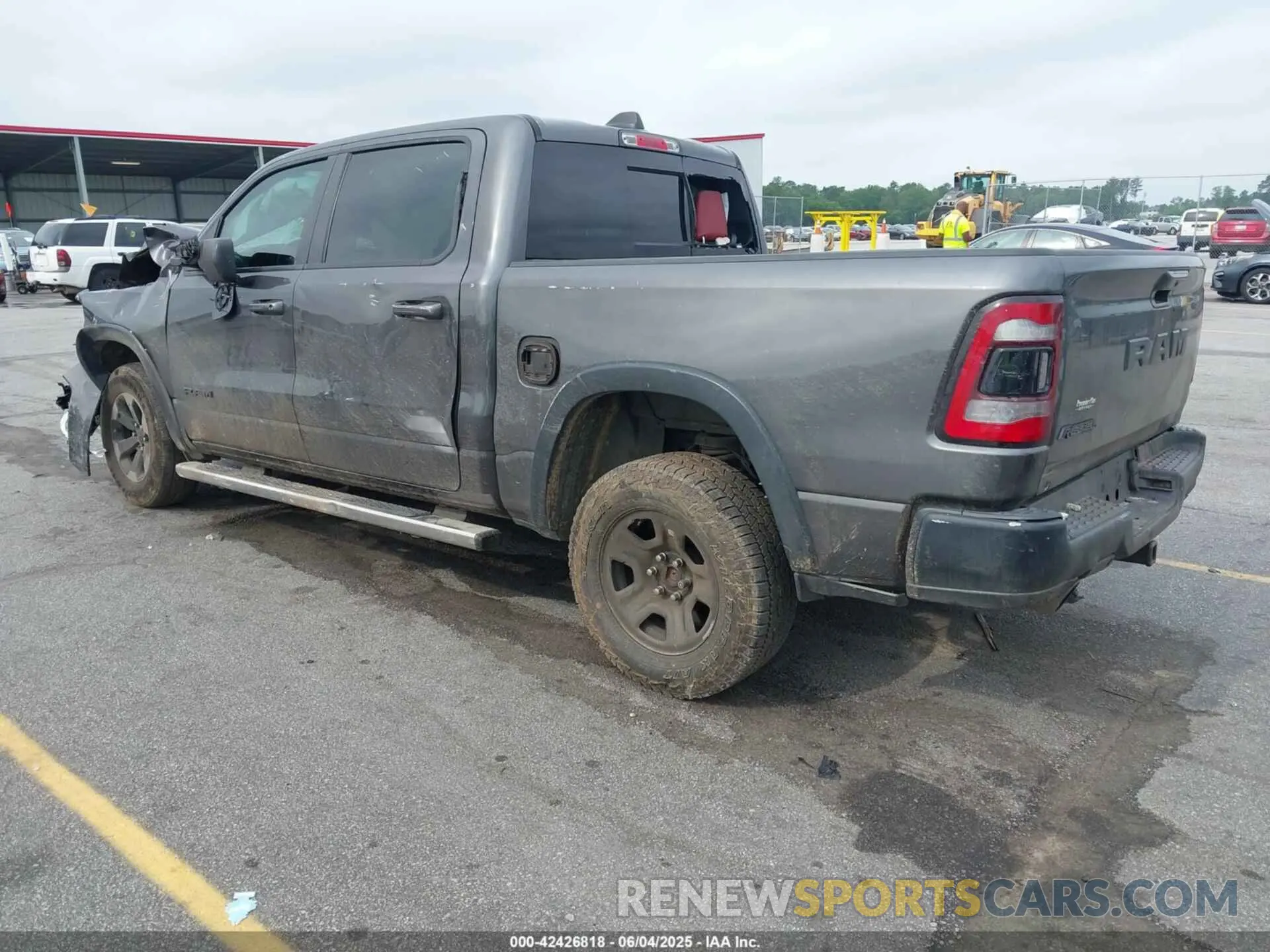 3 Photograph of a damaged car 1C6RRELT5KN625118 RAM 1500 2019