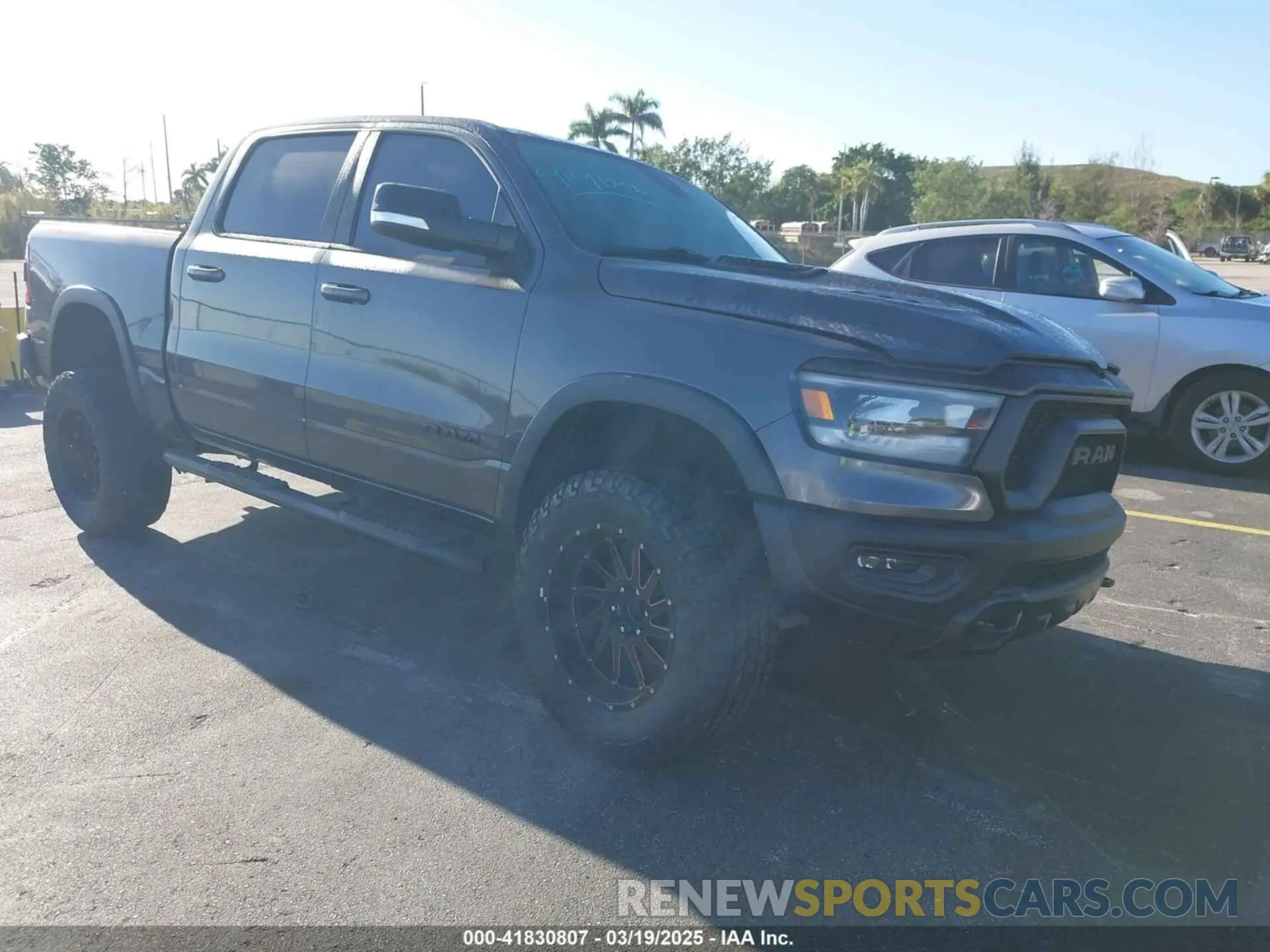 1 Photograph of a damaged car 1C6RRELT8KN549233 RAM 1500 2019