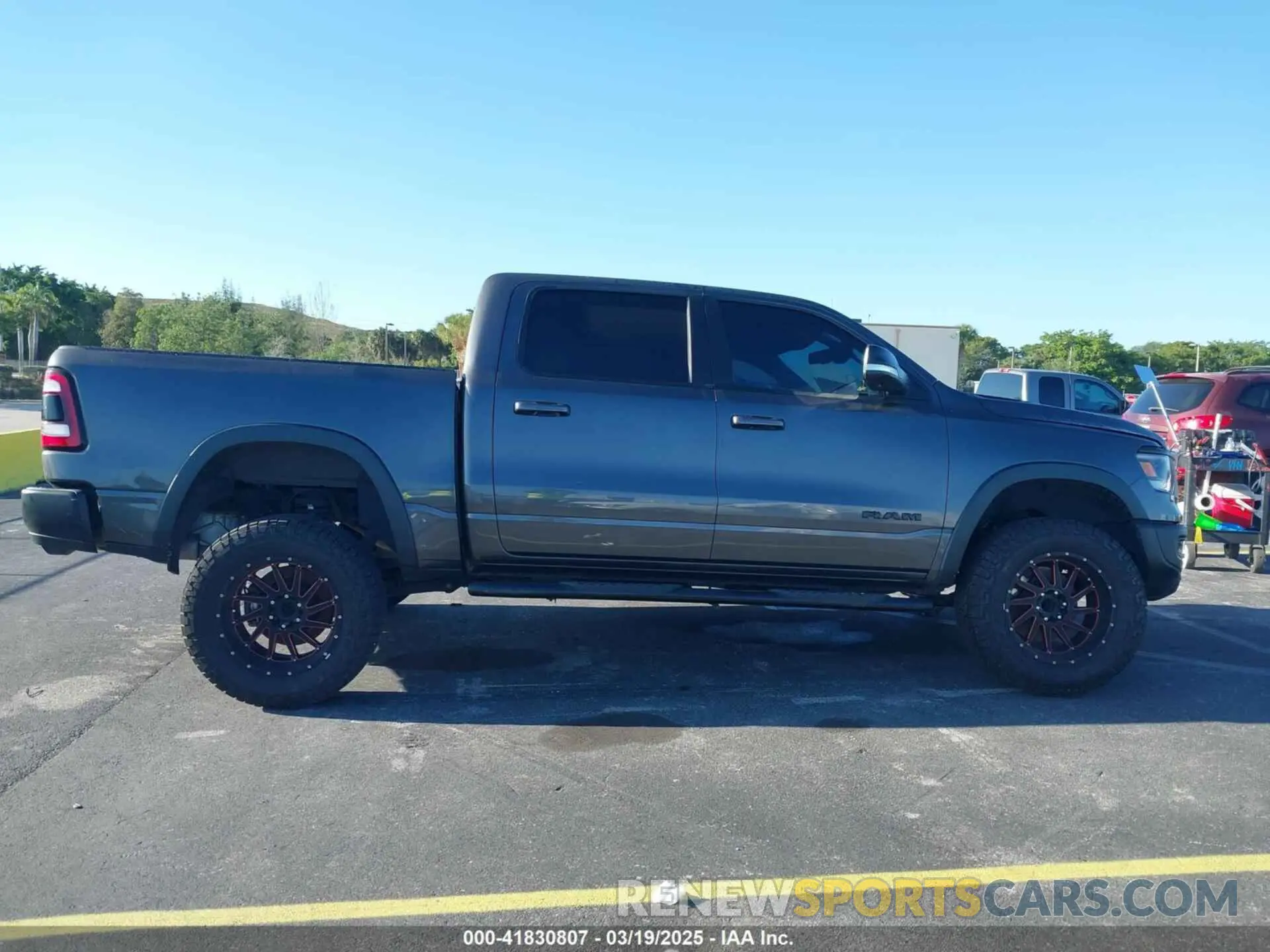 14 Photograph of a damaged car 1C6RRELT8KN549233 RAM 1500 2019