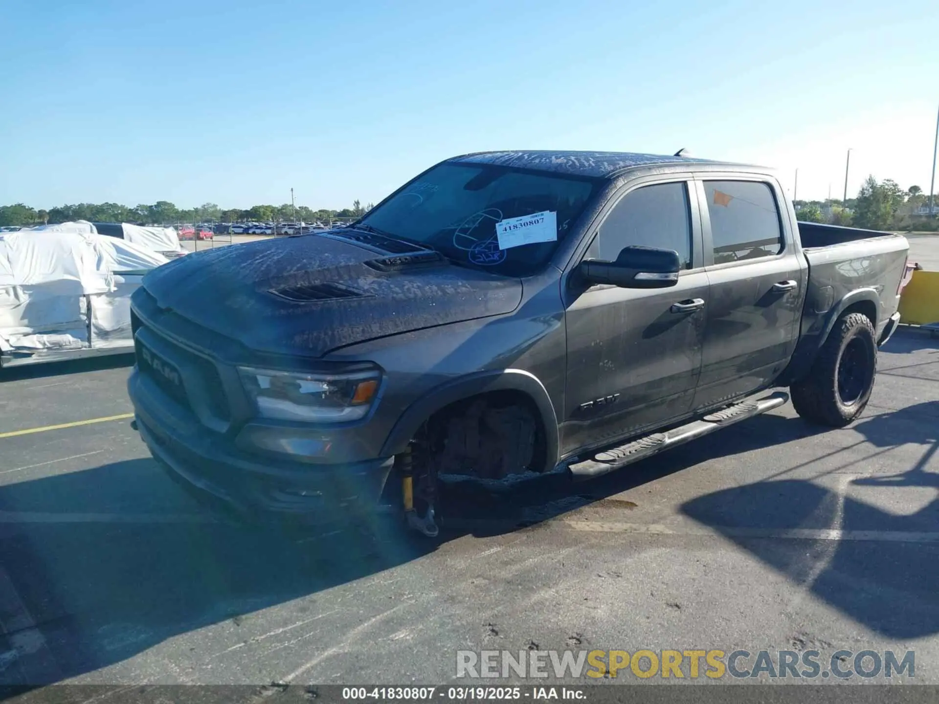 2 Photograph of a damaged car 1C6RRELT8KN549233 RAM 1500 2019
