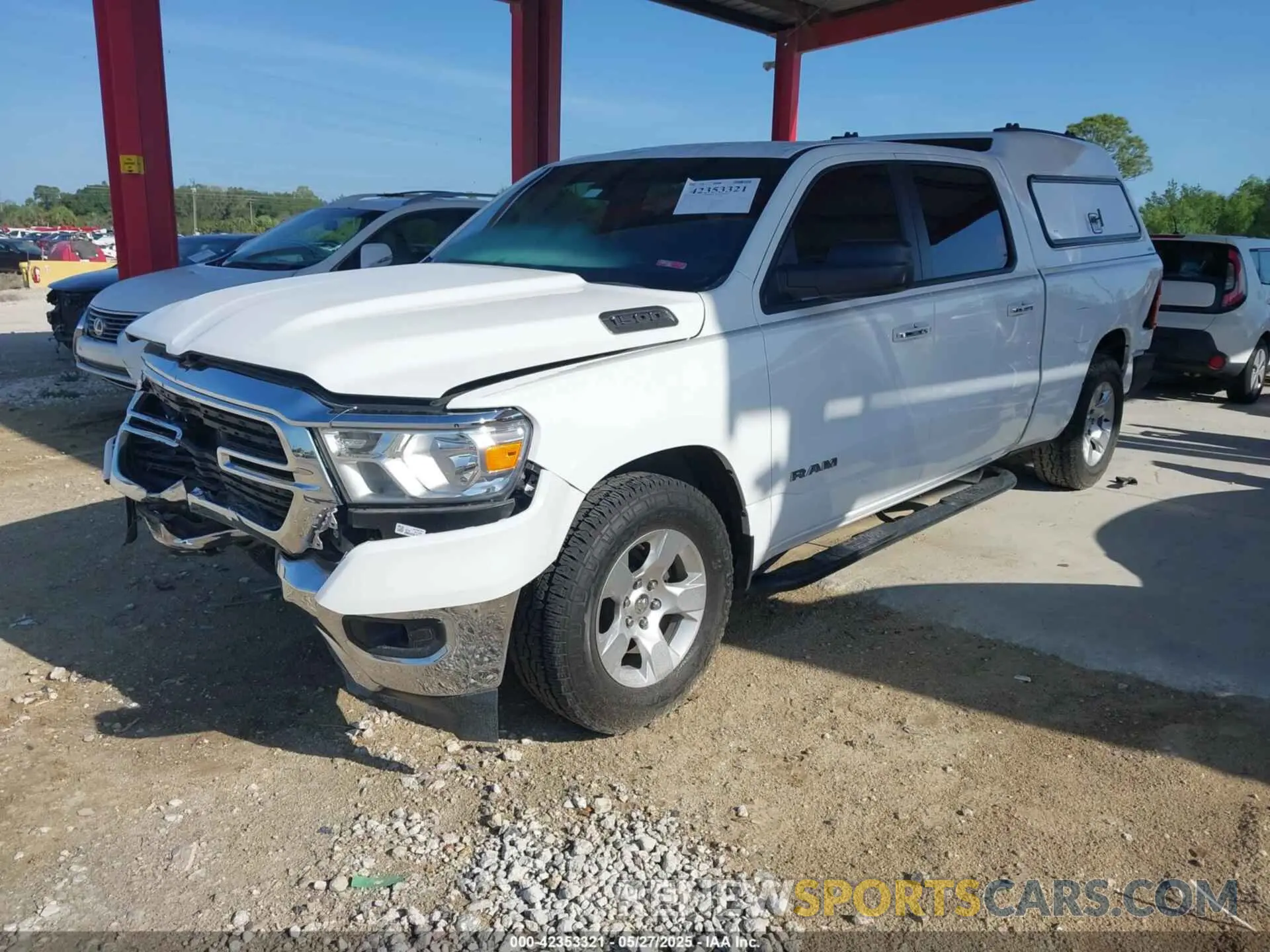 2 Photograph of a damaged car 1C6RREMG9KN891758 RAM 1500 2019