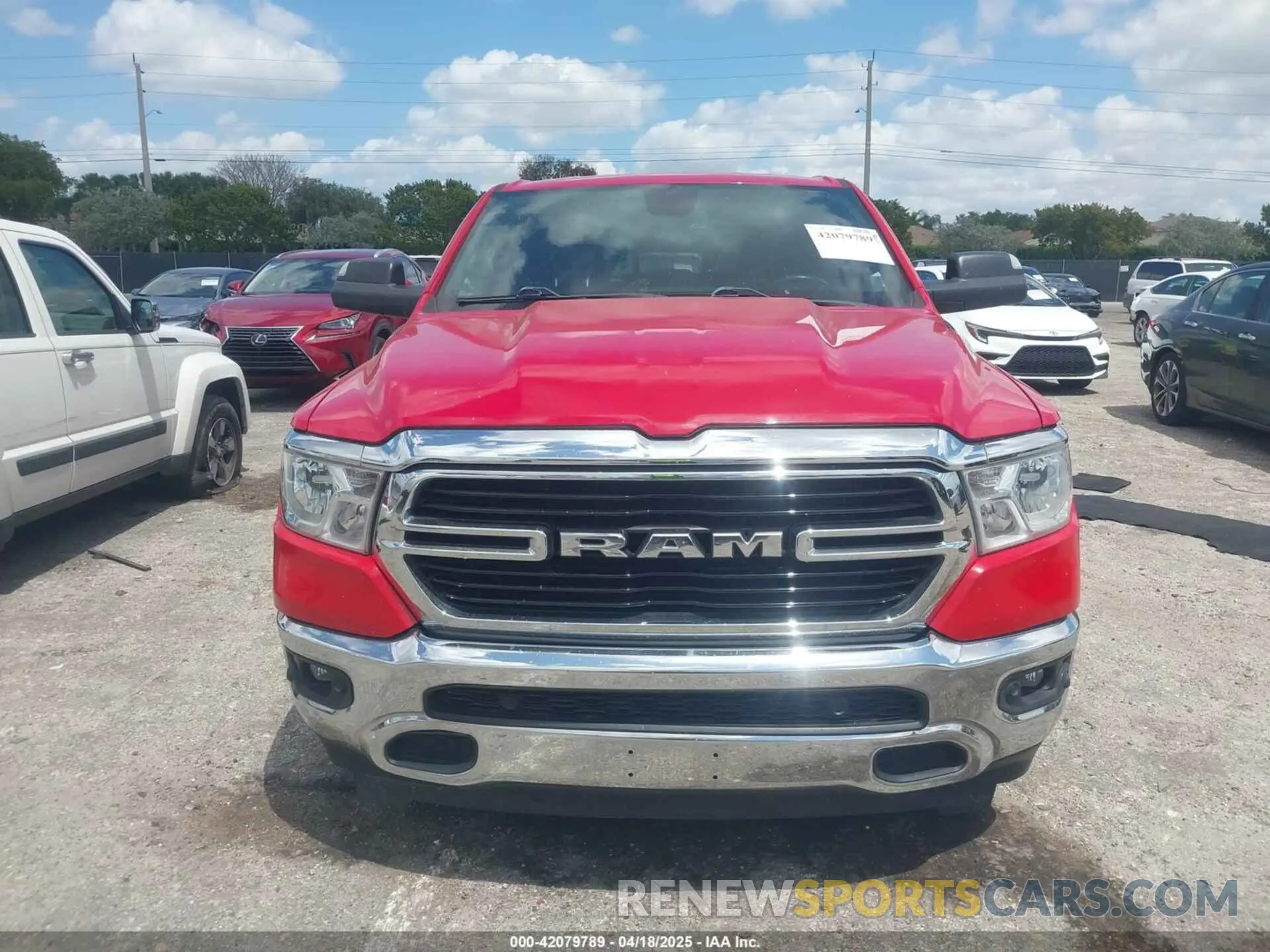12 Photograph of a damaged car 1C6RREMT0KN567823 RAM 1500 2019