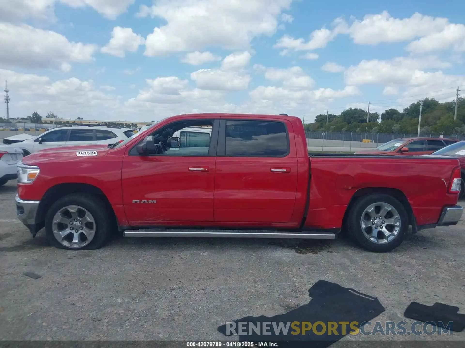14 Photograph of a damaged car 1C6RREMT0KN567823 RAM 1500 2019