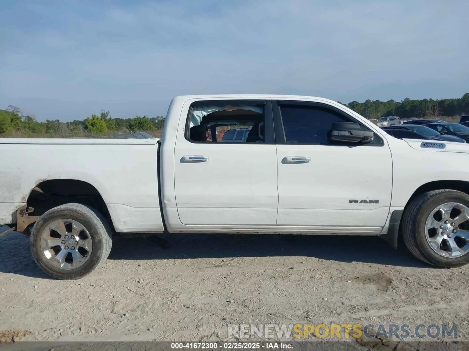 13 Photograph of a damaged car 1C6RREMT2KN913080 RAM 1500 2019