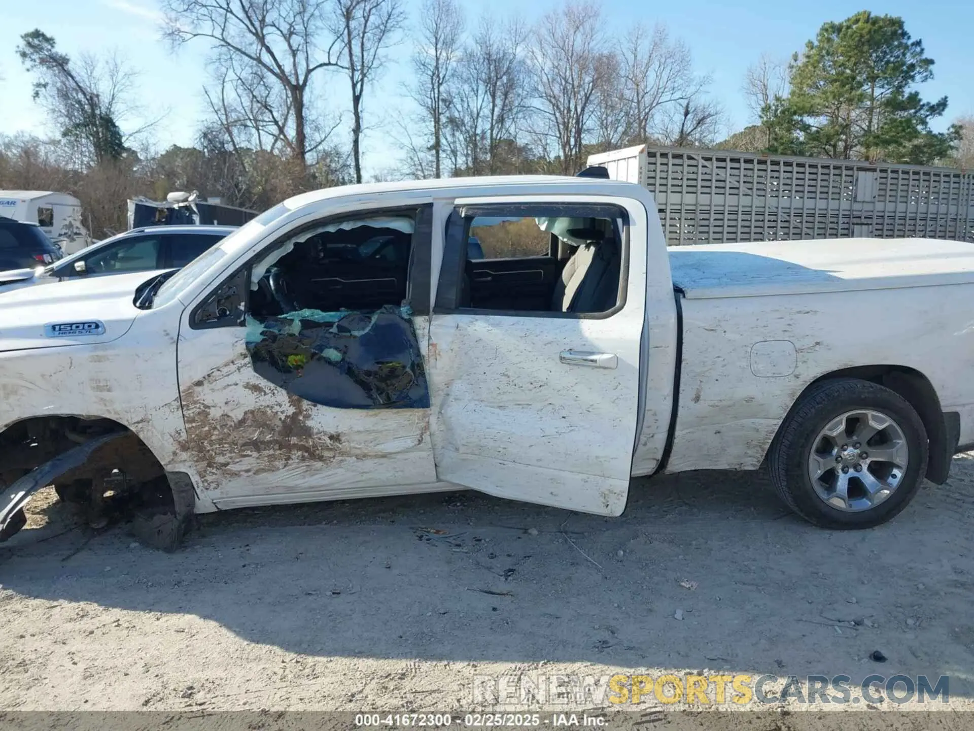 14 Photograph of a damaged car 1C6RREMT2KN913080 RAM 1500 2019