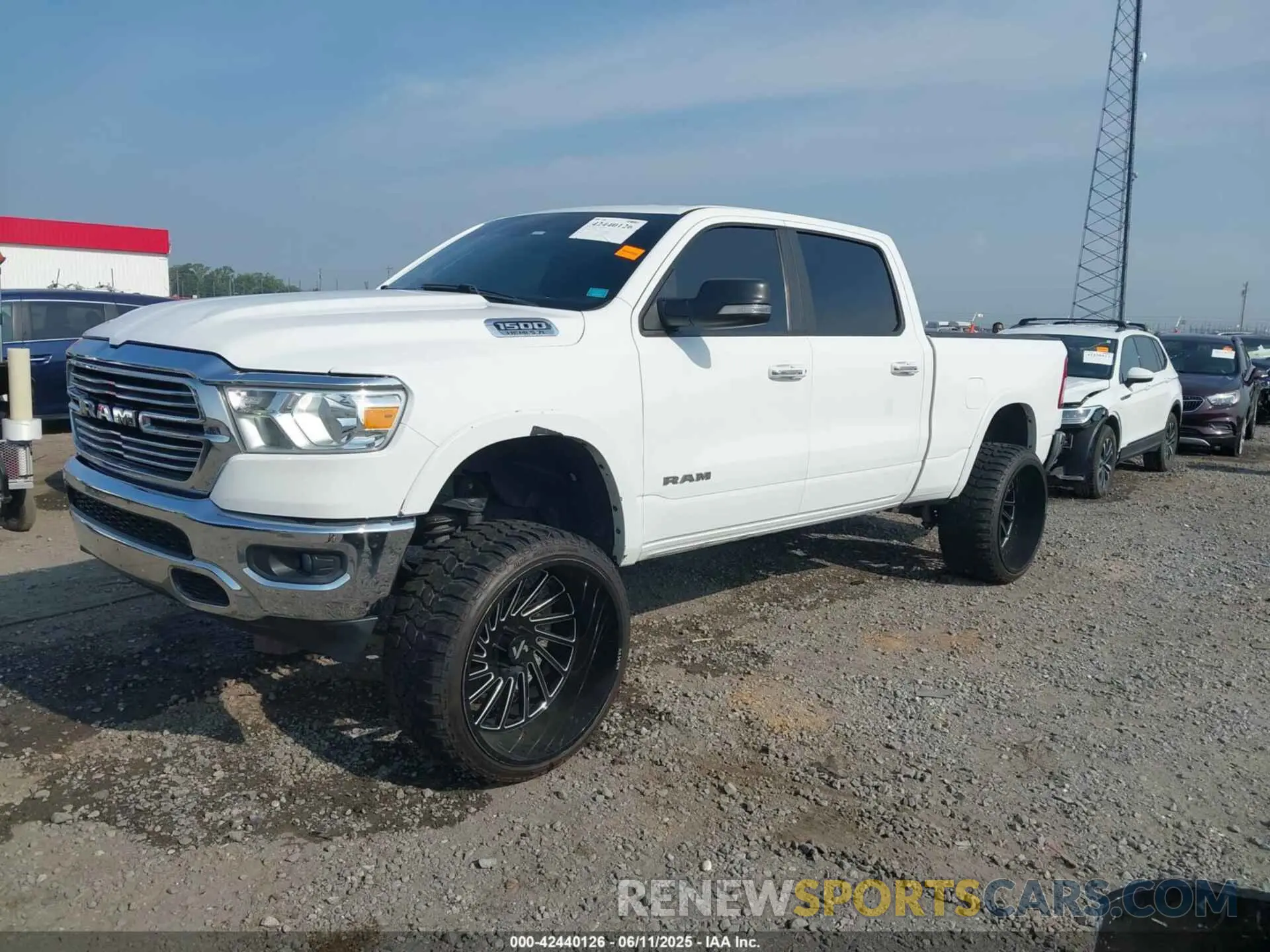 2 Photograph of a damaged car 1C6RREMT4KN891115 RAM 1500 2019