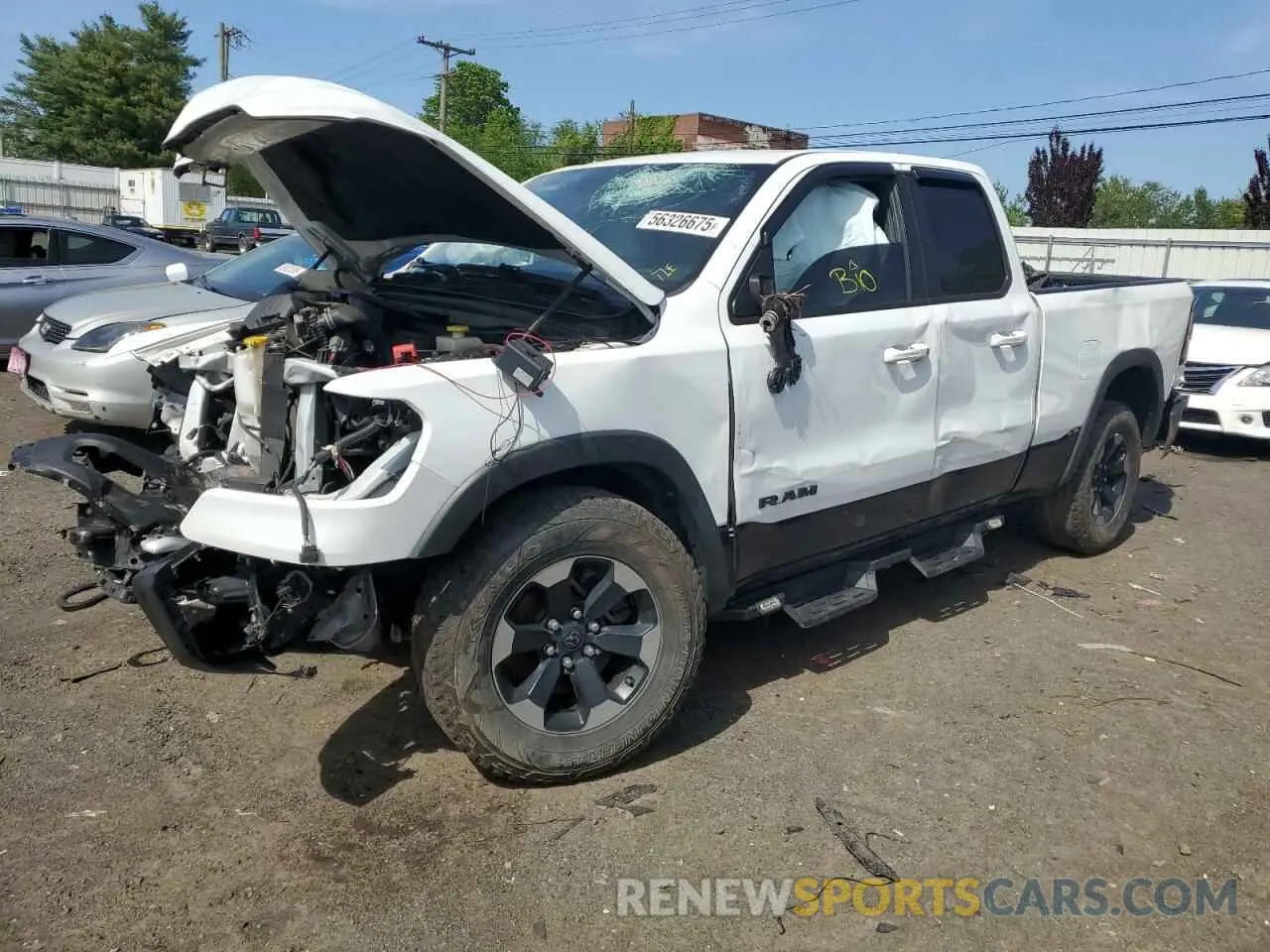1 Photograph of a damaged car 1C6RRFEG6KN861248 RAM 1500 2019