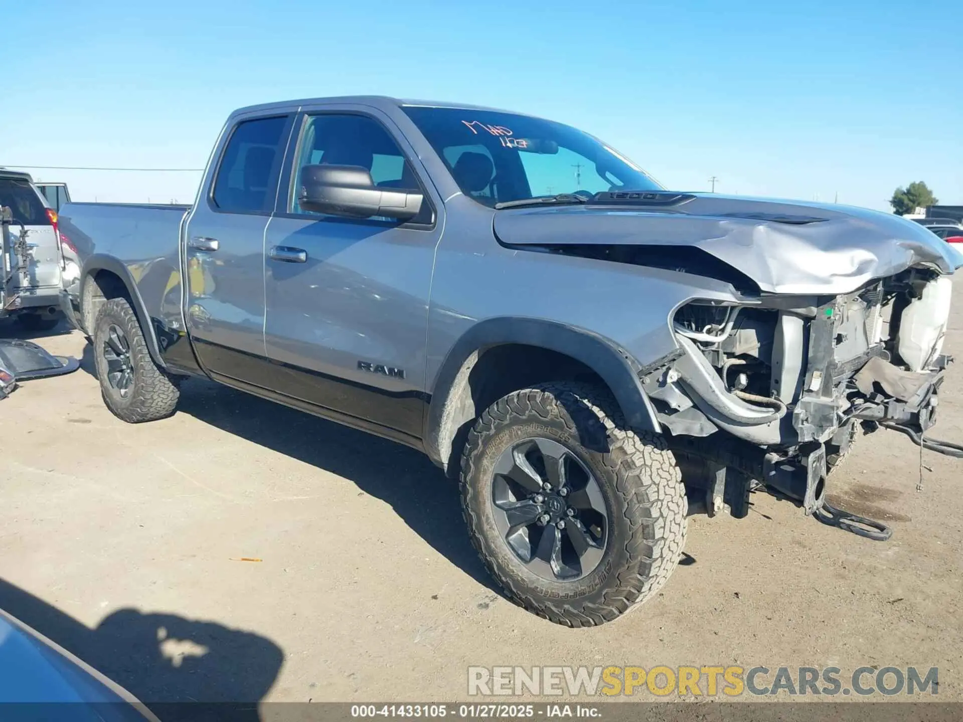 1 Photograph of a damaged car 1C6RRFEG8KN887978 RAM 1500 2019
