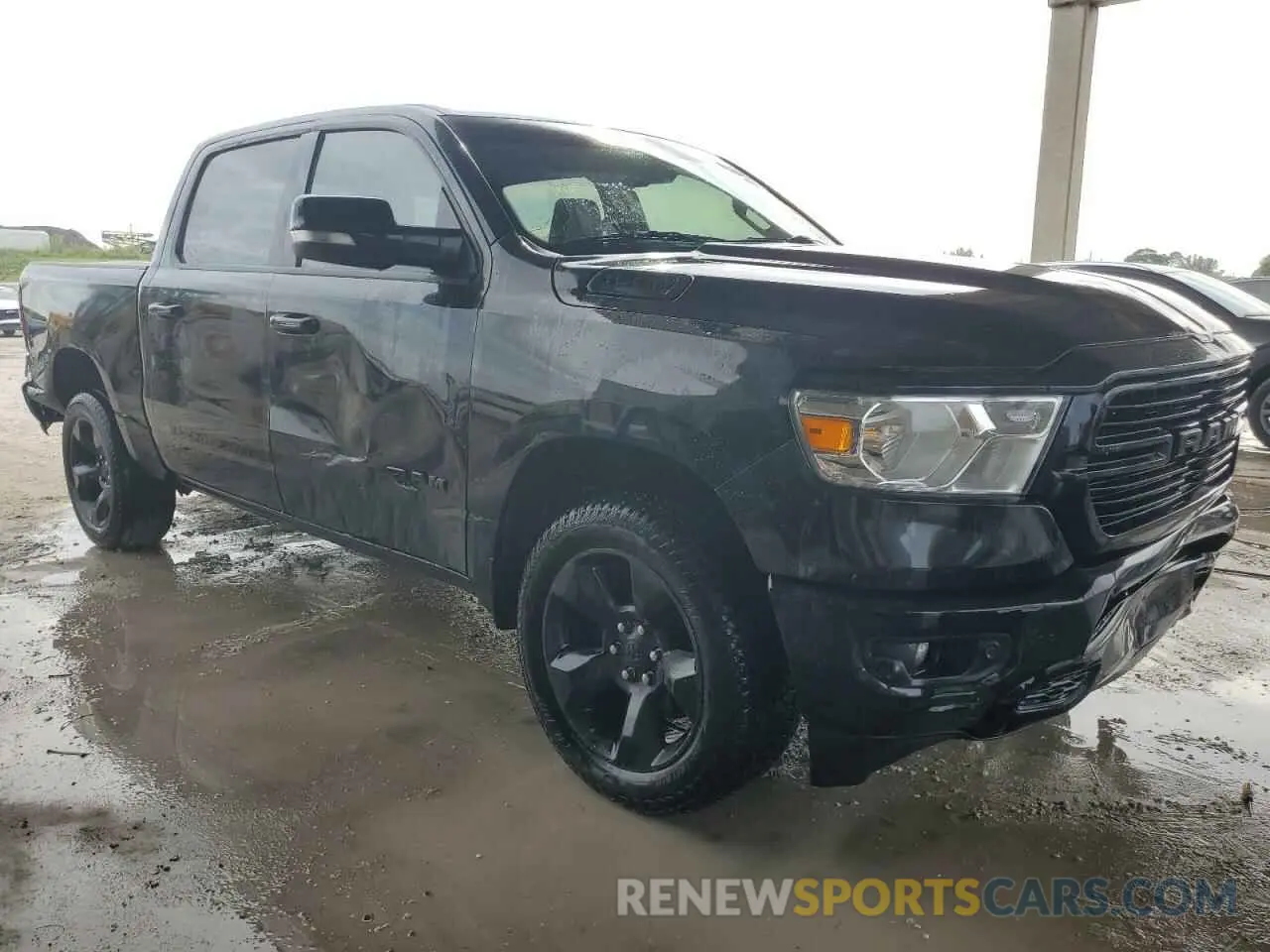 4 Photograph of a damaged car 1C6RRFFG0KN737636 RAM 1500 2019