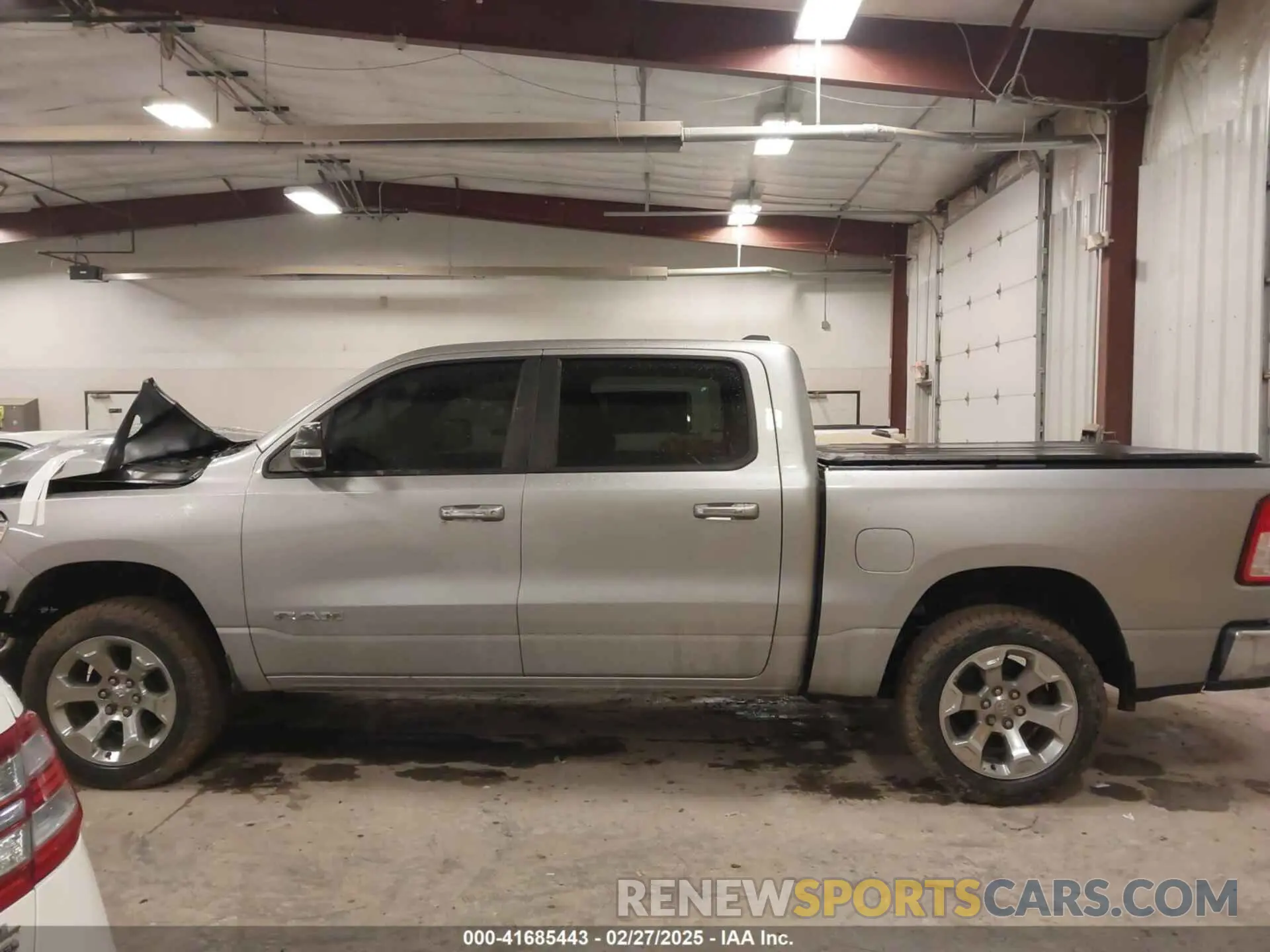 14 Photograph of a damaged car 1C6RRFFG0KN818782 RAM 1500 2019
