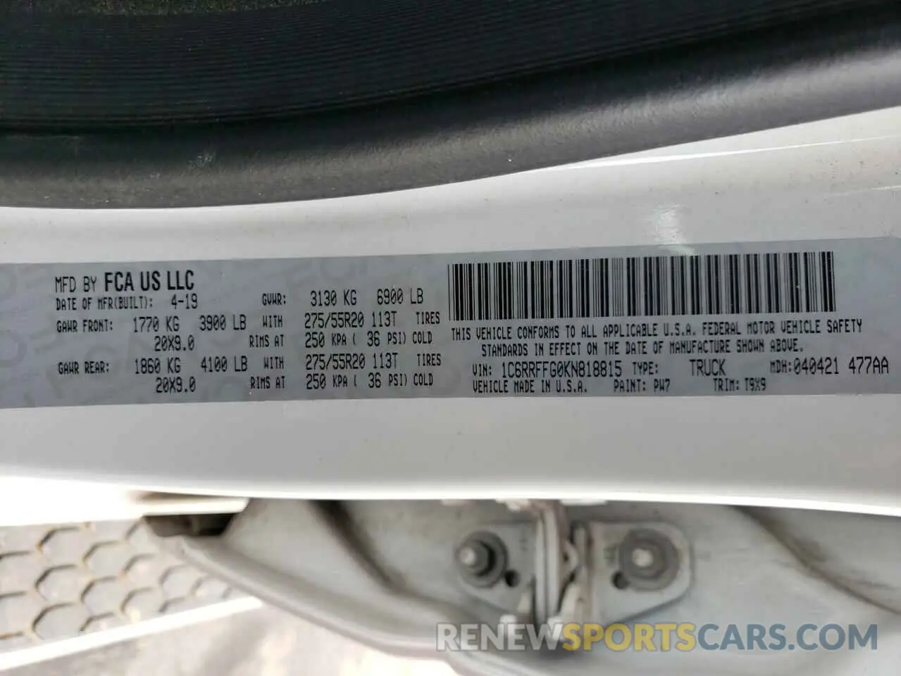 13 Photograph of a damaged car 1C6RRFFG0KN818815 RAM 1500 2019