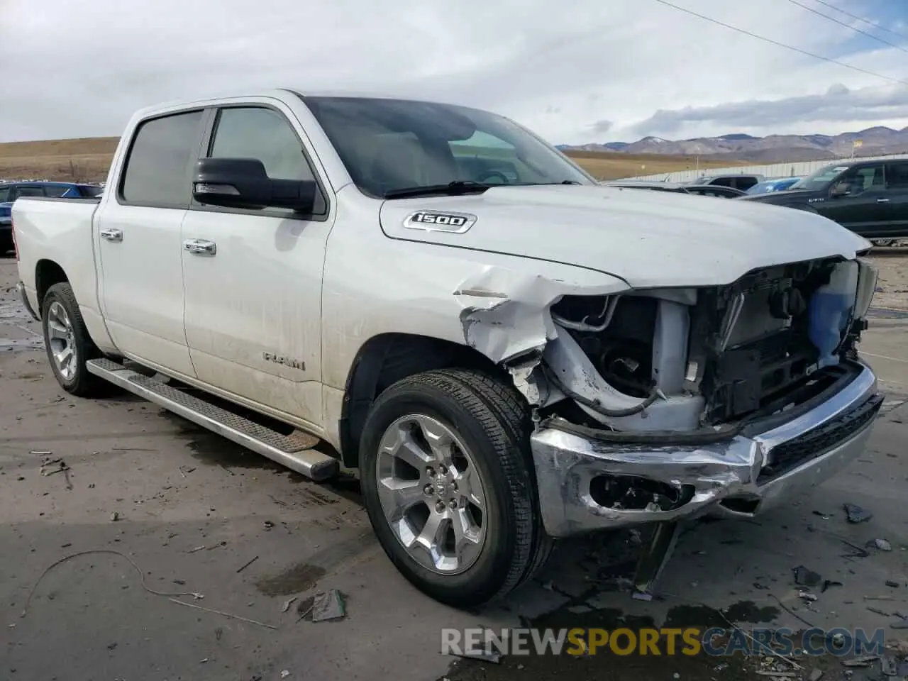 4 Photograph of a damaged car 1C6RRFFG0KN818815 RAM 1500 2019