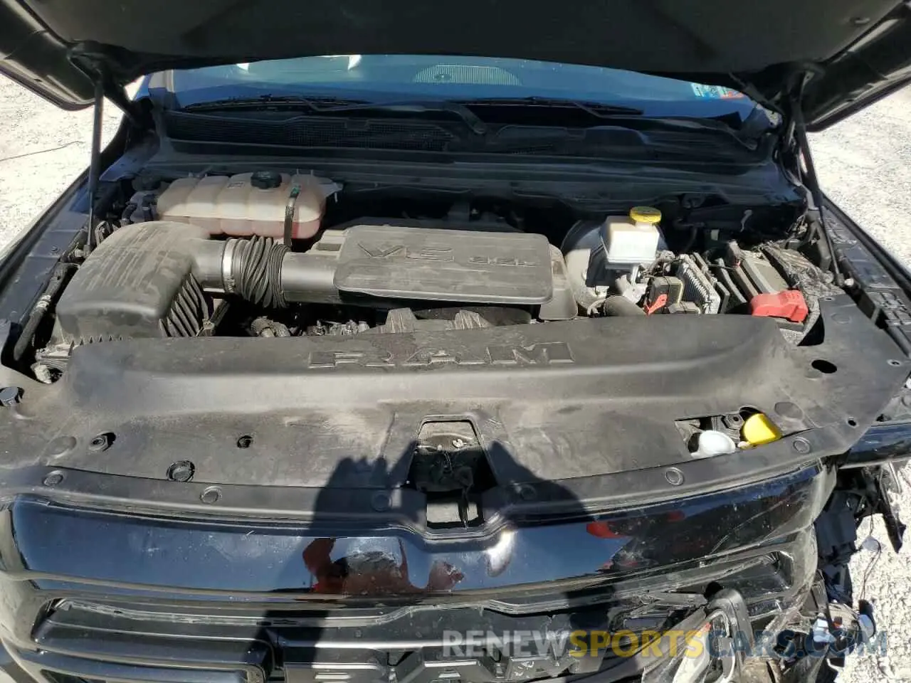 11 Photograph of a damaged car 1C6RRFFG0KN857081 RAM 1500 2019