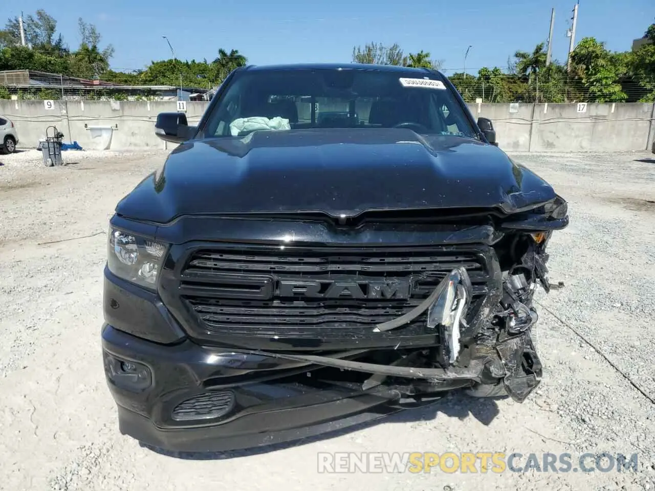 5 Photograph of a damaged car 1C6RRFFG0KN857081 RAM 1500 2019