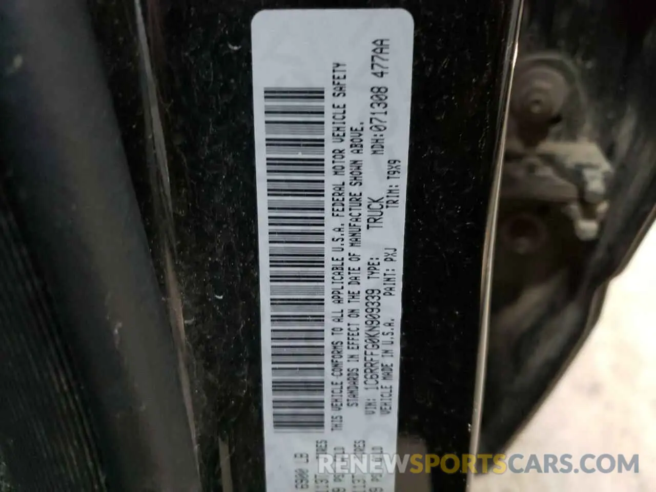 12 Photograph of a damaged car 1C6RRFFG0KN909339 RAM 1500 2019
