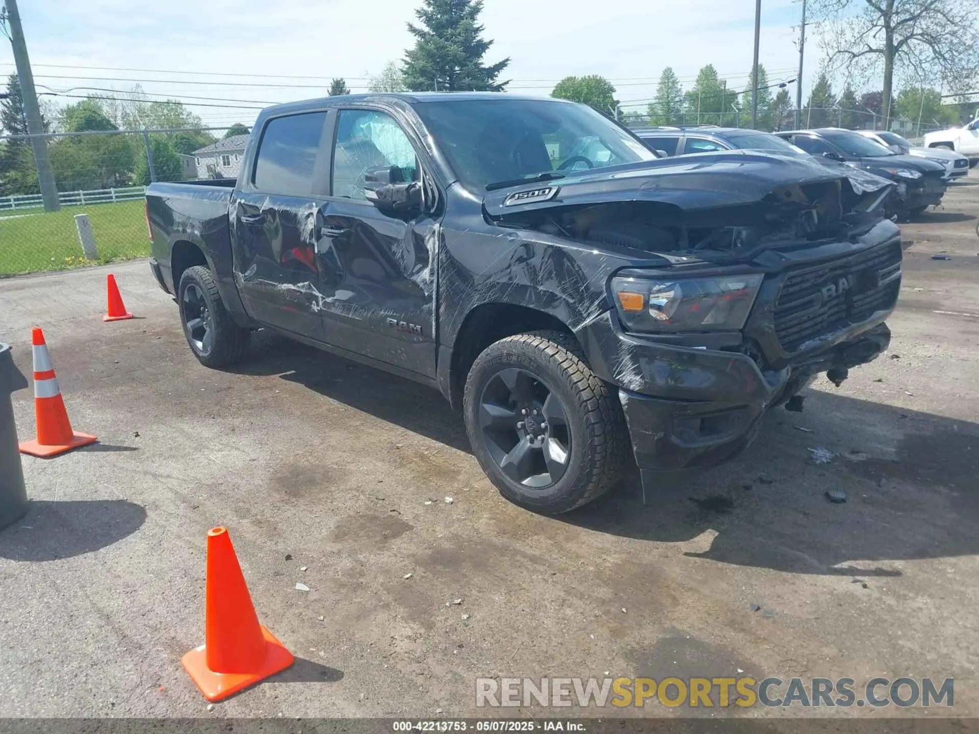 1 Photograph of a damaged car 1C6RRFFG0KN919093 RAM 1500 2019