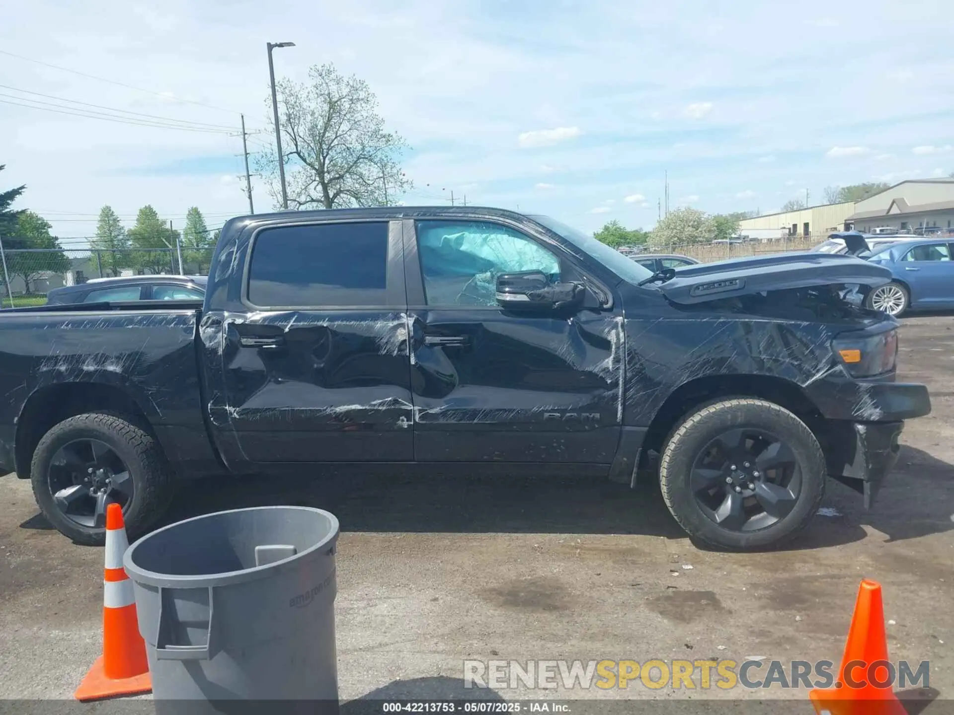 13 Photograph of a damaged car 1C6RRFFG0KN919093 RAM 1500 2019