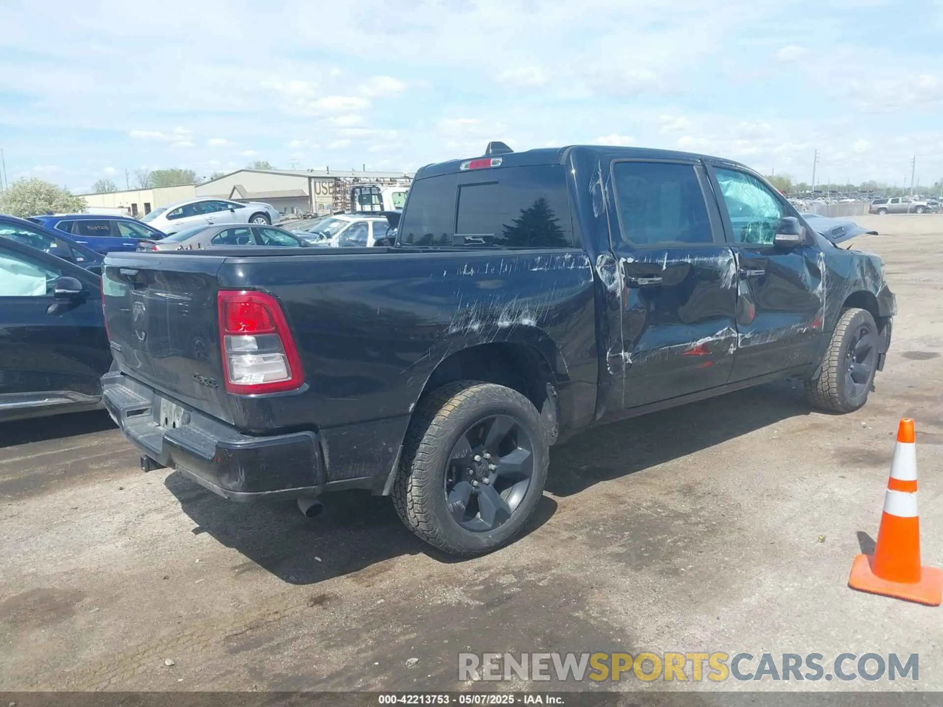 4 Photograph of a damaged car 1C6RRFFG0KN919093 RAM 1500 2019