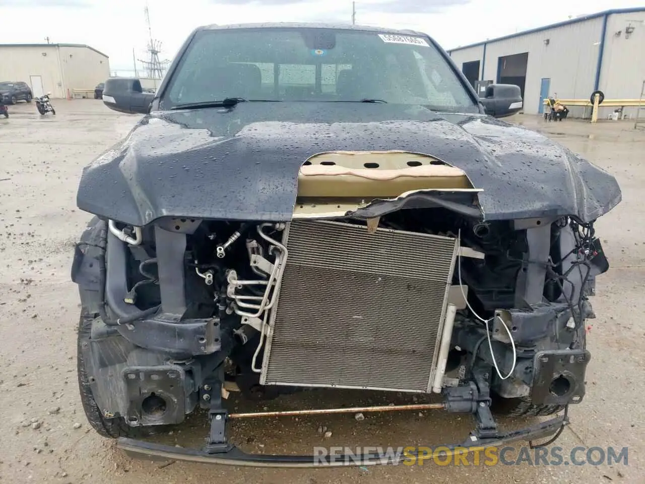 5 Photograph of a damaged car 1C6RRFFG1KN728055 RAM 1500 2019