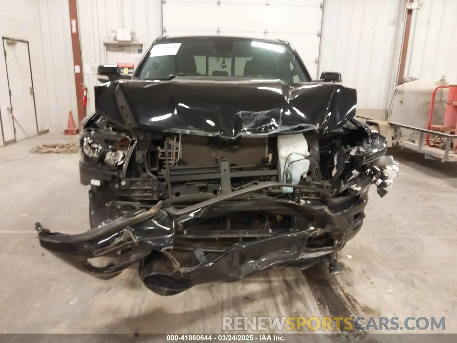 11 Photograph of a damaged car 1C6RRFFG2KN847023 RAM 1500 2019
