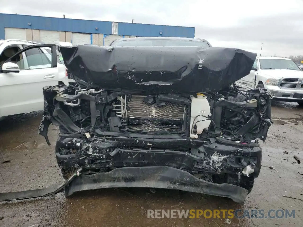 5 Photograph of a damaged car 1C6RRFFG2KN881477 RAM 1500 2019