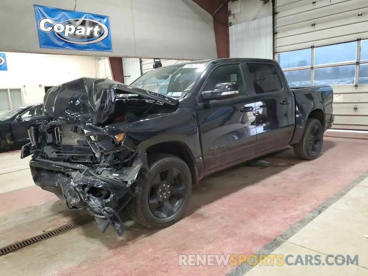 1 Photograph of a damaged car 1C6RRFFG2KN908810 RAM 1500 2019