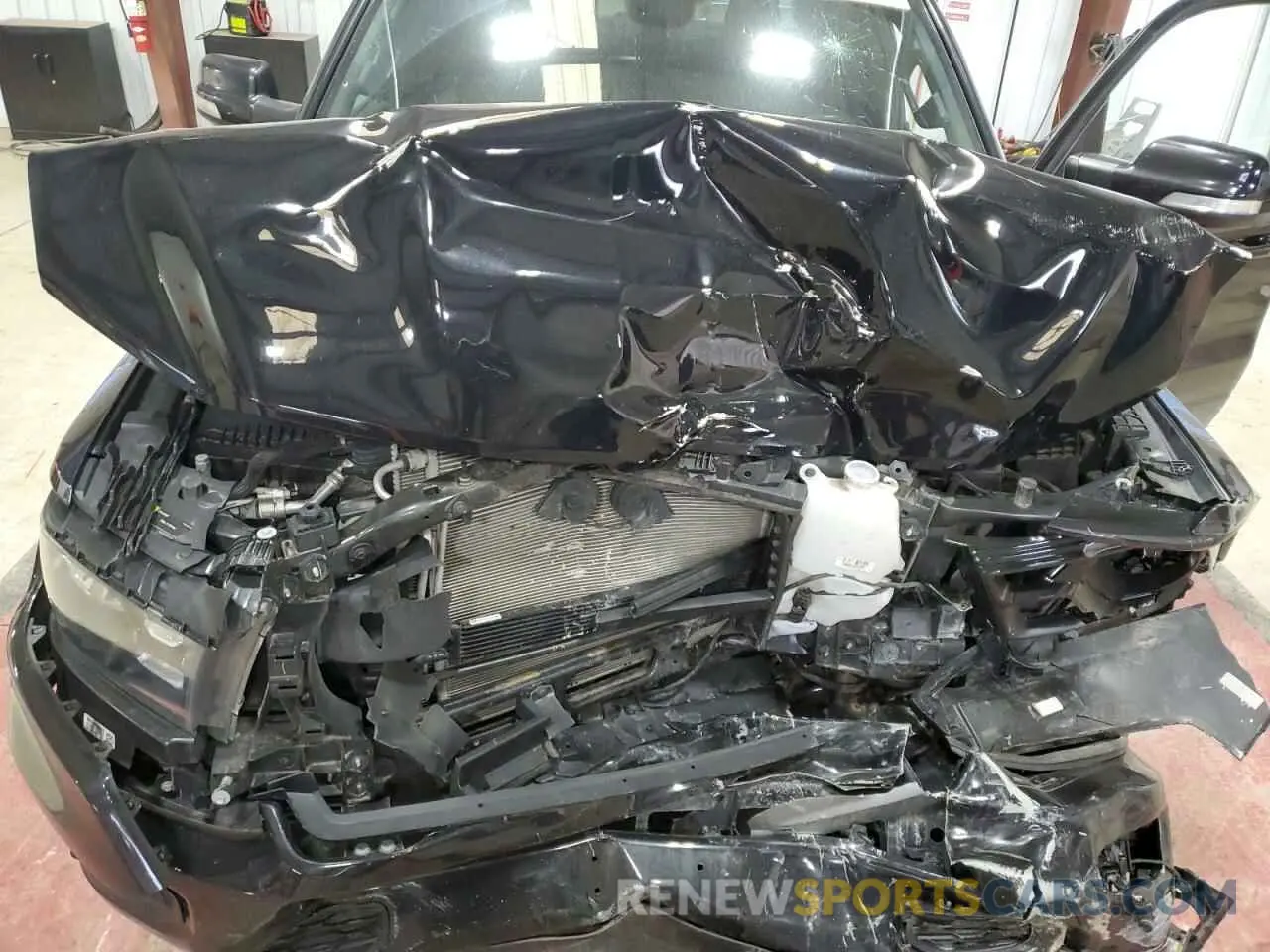 11 Photograph of a damaged car 1C6RRFFG2KN908810 RAM 1500 2019