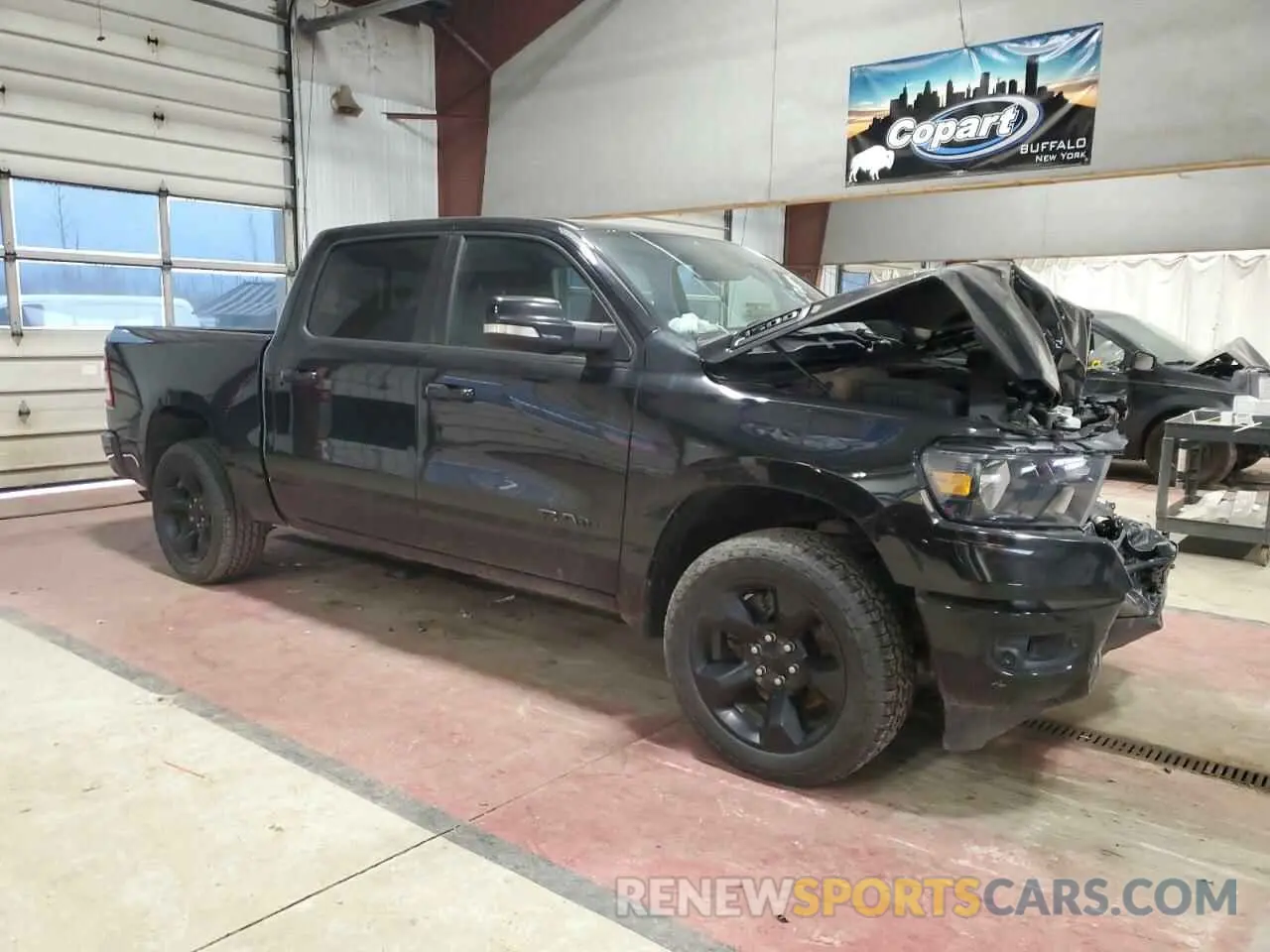 4 Photograph of a damaged car 1C6RRFFG2KN908810 RAM 1500 2019