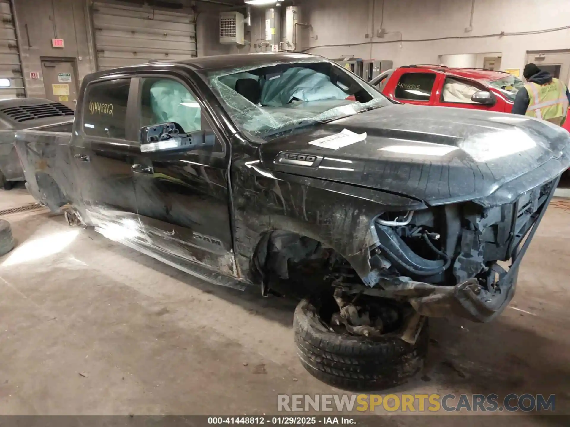 1 Photograph of a damaged car 1C6RRFFG3KN721950 RAM 1500 2019