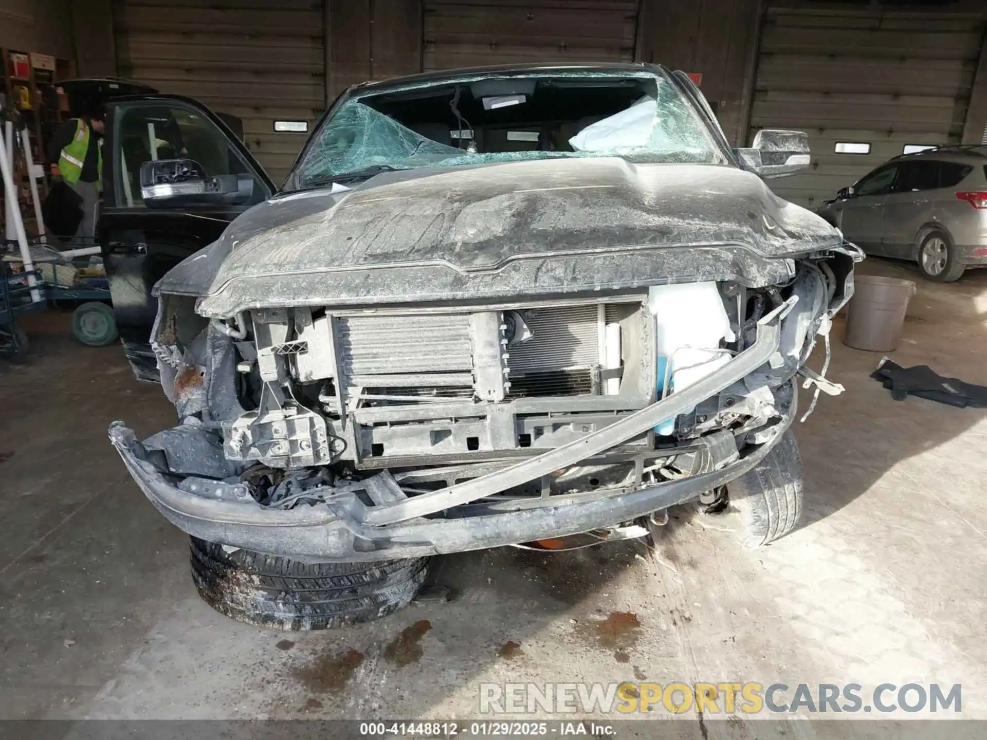 12 Photograph of a damaged car 1C6RRFFG3KN721950 RAM 1500 2019