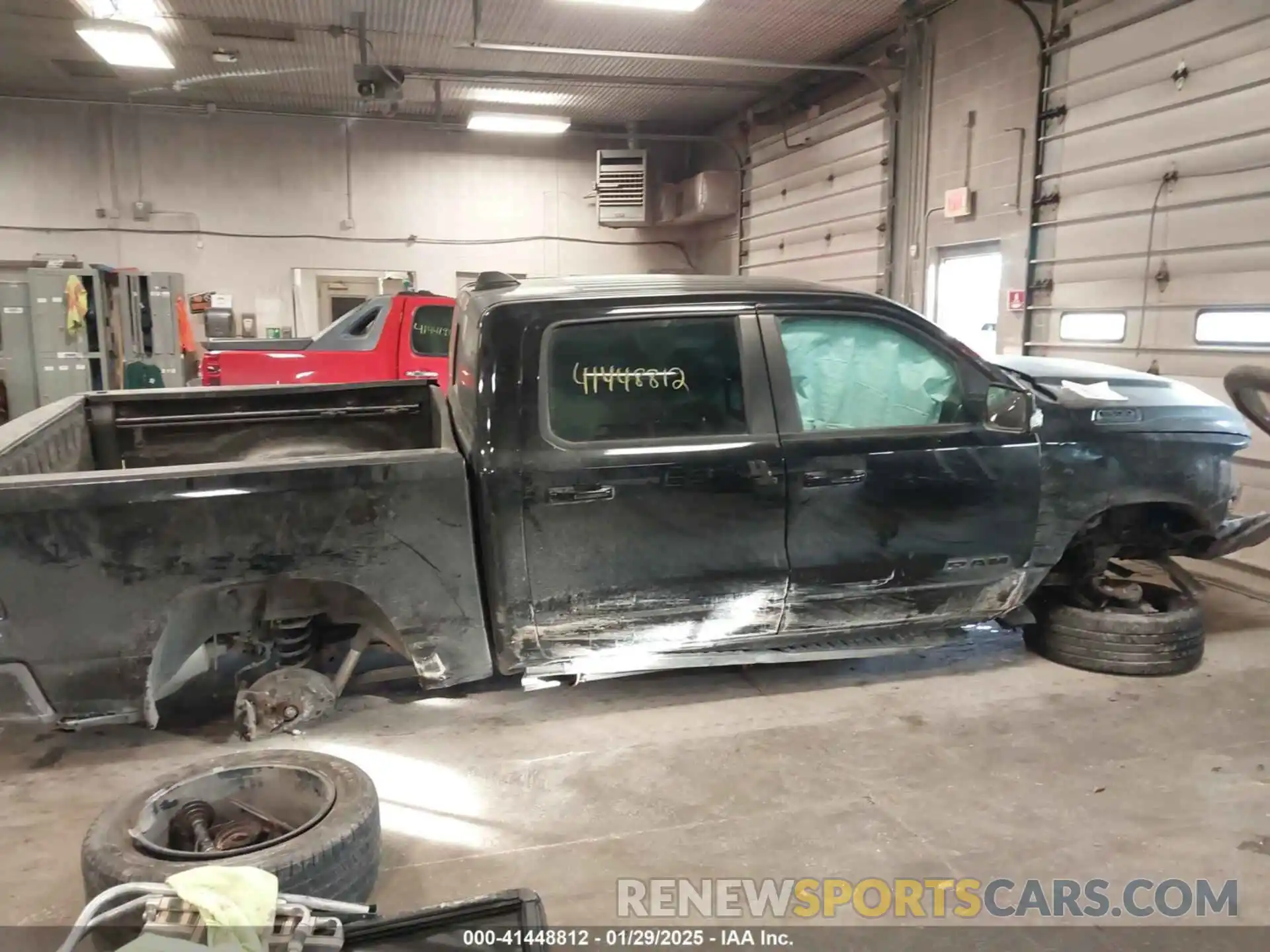 13 Photograph of a damaged car 1C6RRFFG3KN721950 RAM 1500 2019