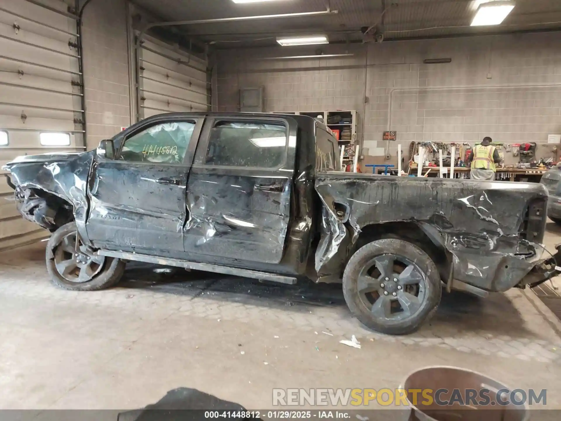 14 Photograph of a damaged car 1C6RRFFG3KN721950 RAM 1500 2019