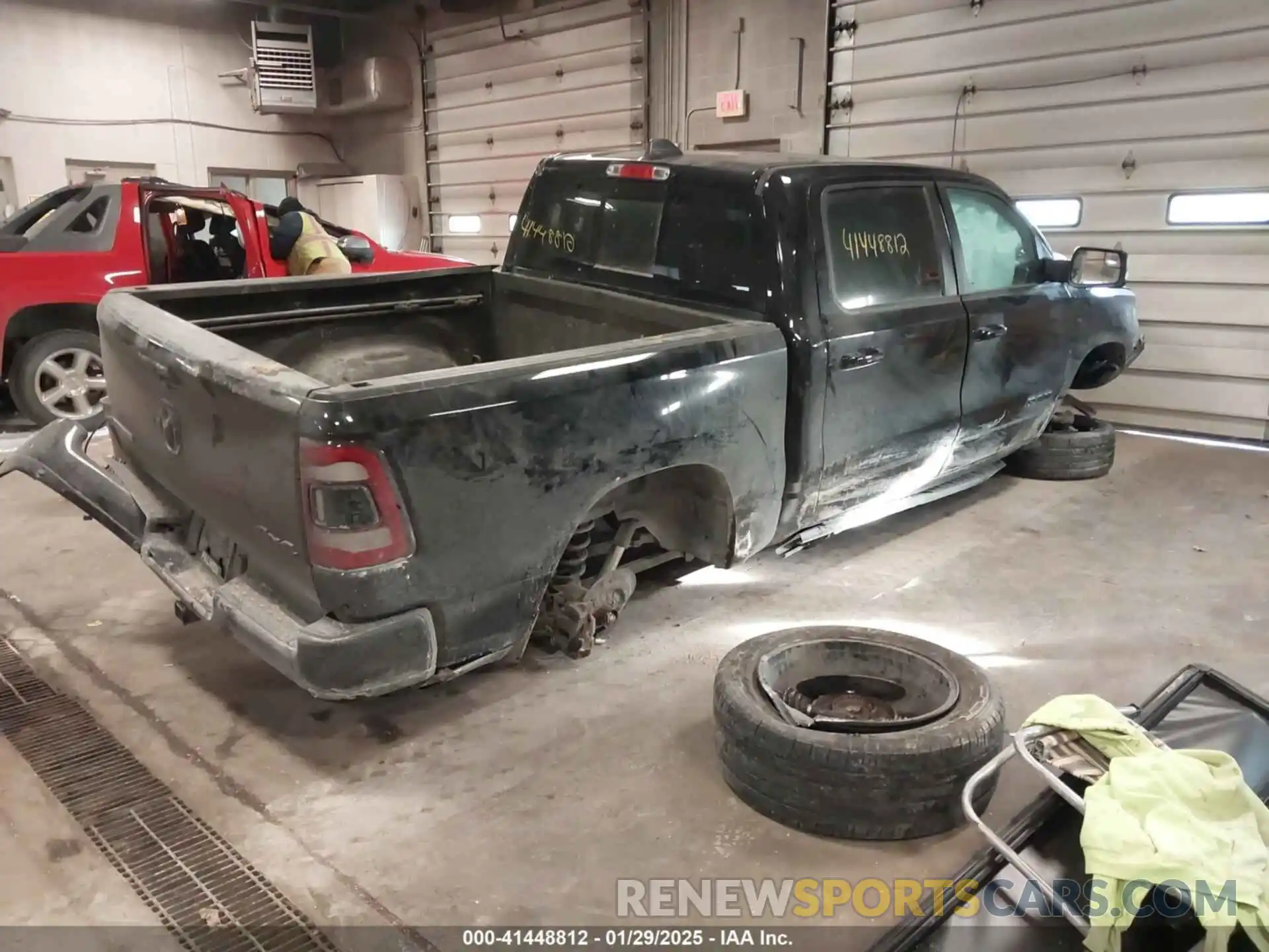 4 Photograph of a damaged car 1C6RRFFG3KN721950 RAM 1500 2019