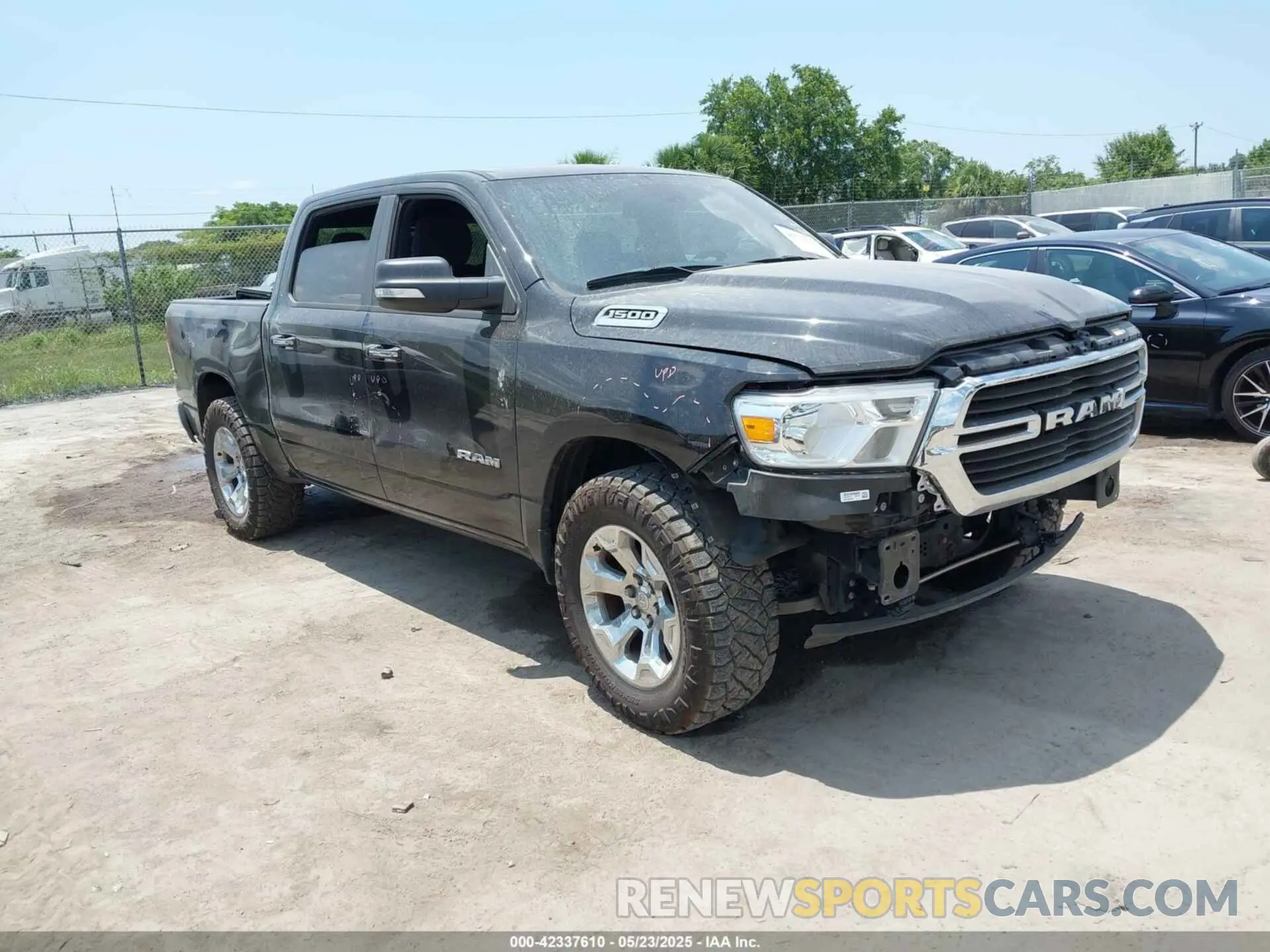 1 Photograph of a damaged car 1C6RRFFG7KN723216 RAM 1500 2019