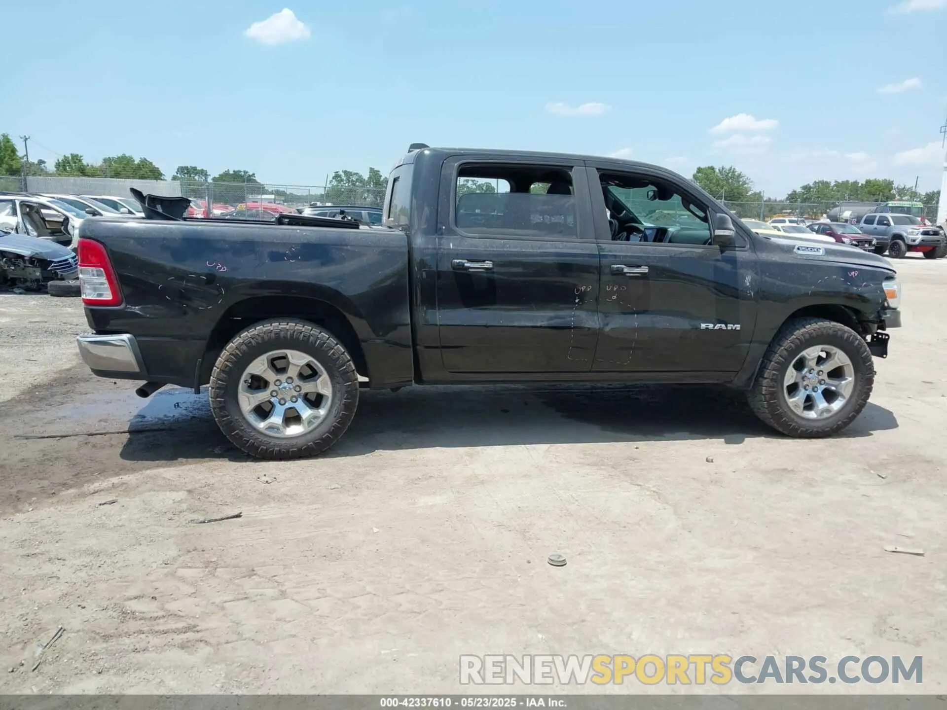 13 Photograph of a damaged car 1C6RRFFG7KN723216 RAM 1500 2019