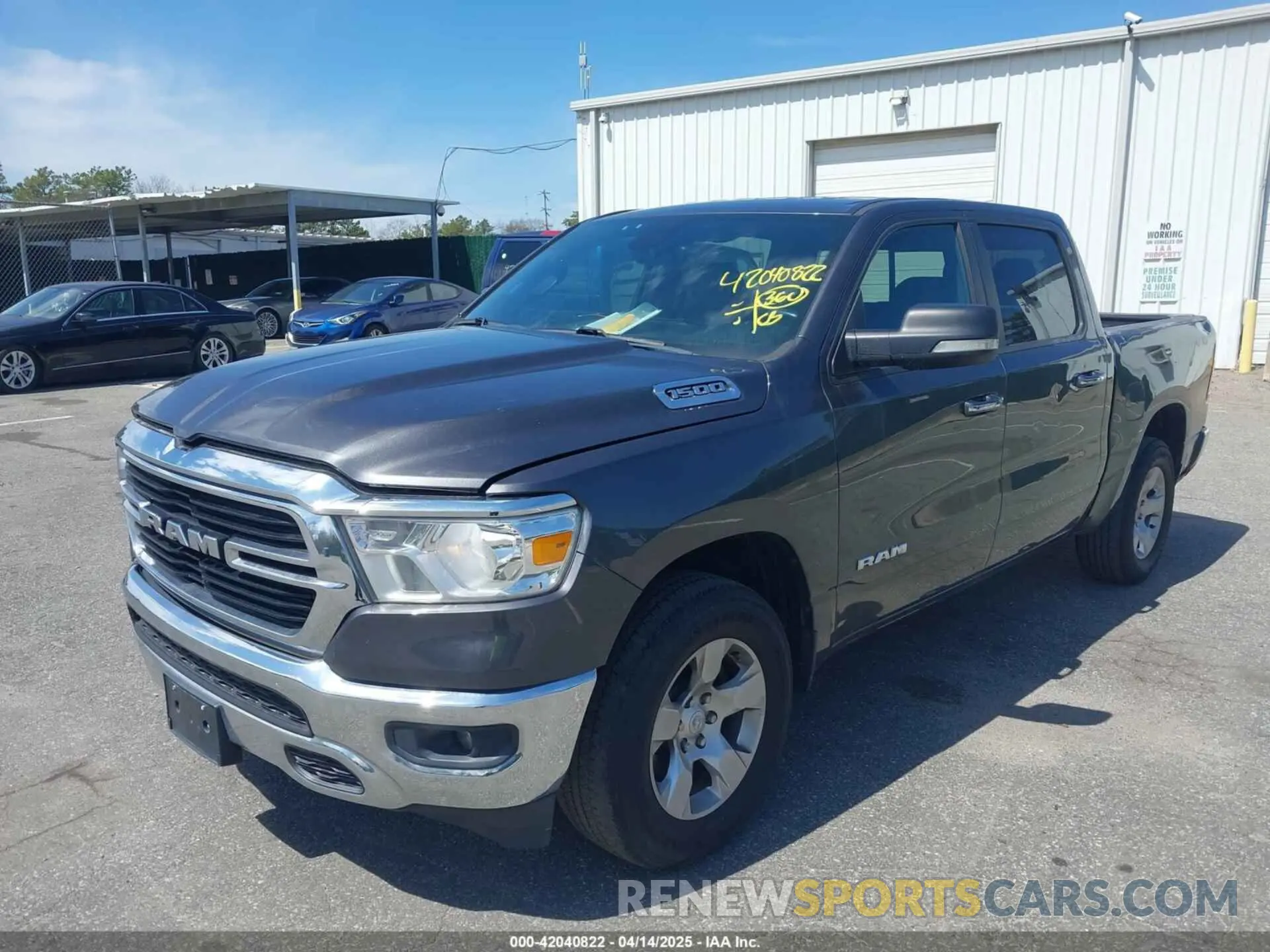 2 Photograph of a damaged car 1C6RRFFG7KN782511 RAM 1500 2019