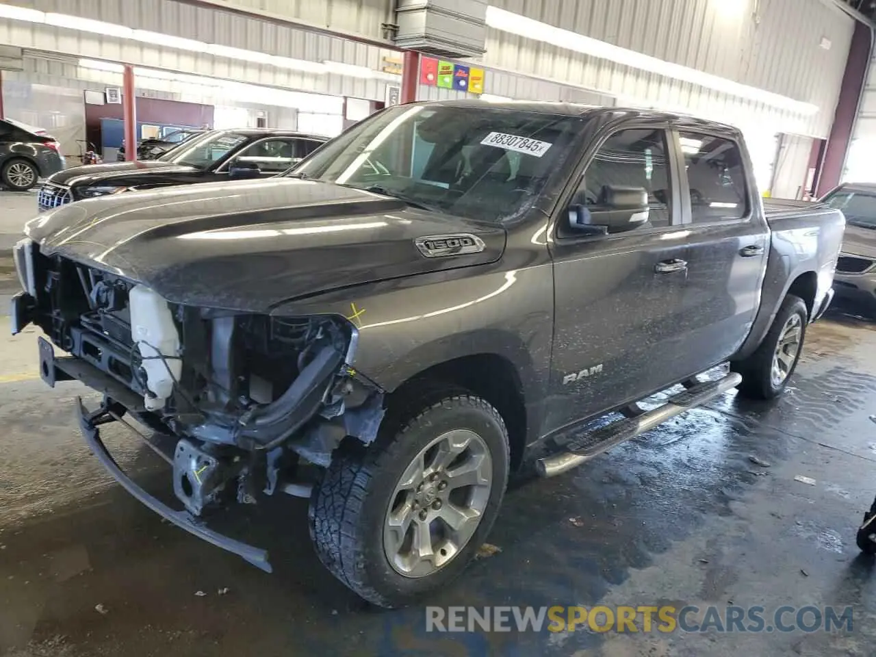 1 Photograph of a damaged car 1C6RRFFG8KN796885 RAM 1500 2019