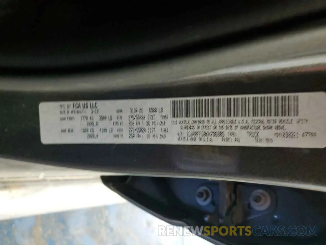 12 Photograph of a damaged car 1C6RRFFG8KN796885 RAM 1500 2019