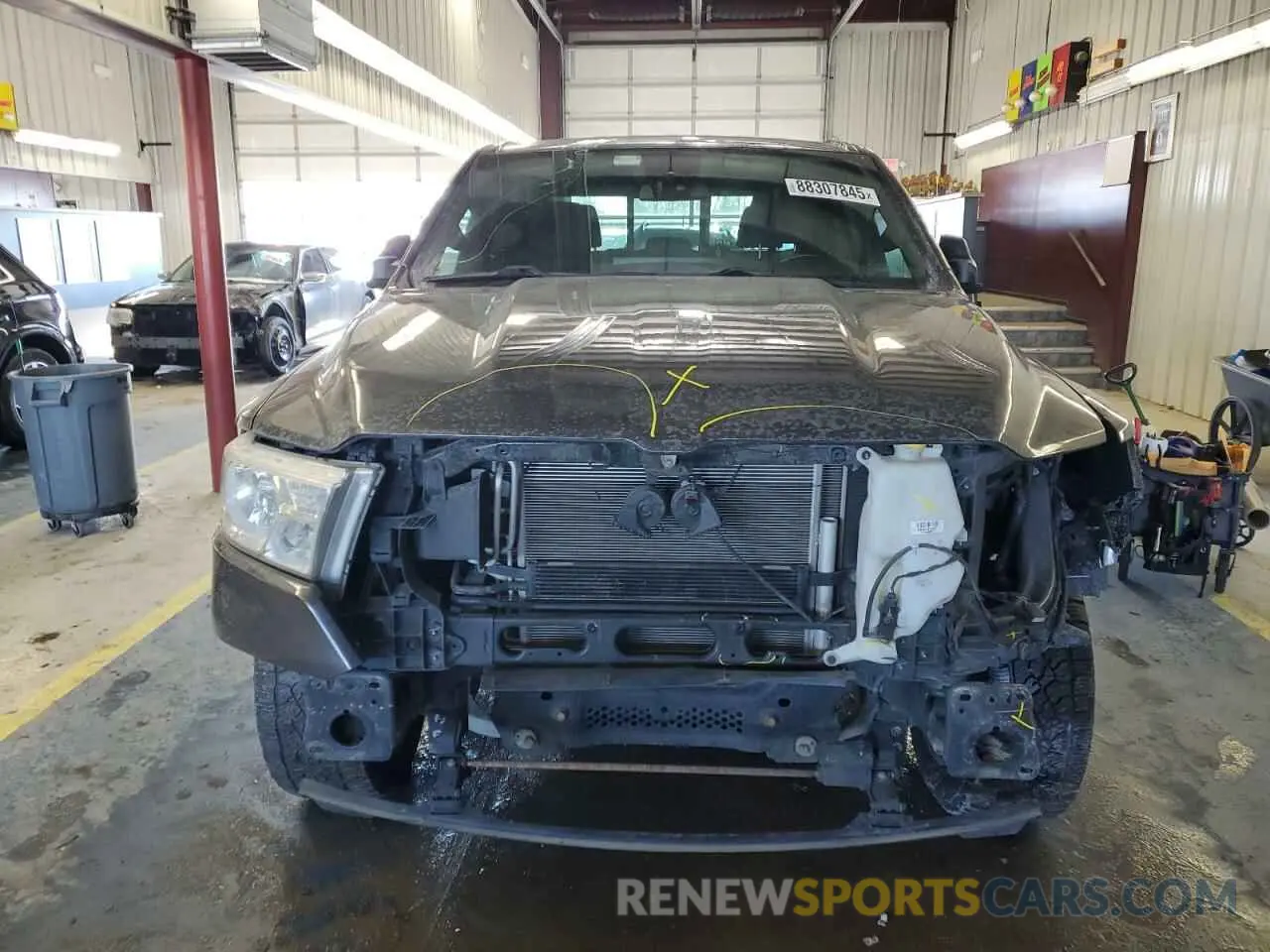 5 Photograph of a damaged car 1C6RRFFG8KN796885 RAM 1500 2019