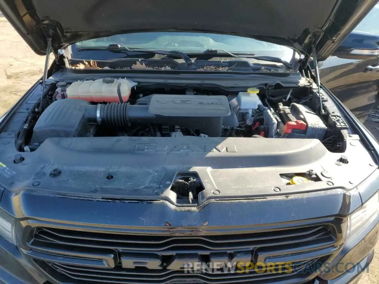 11 Photograph of a damaged car 1C6RRFFG8KN903871 RAM 1500 2019