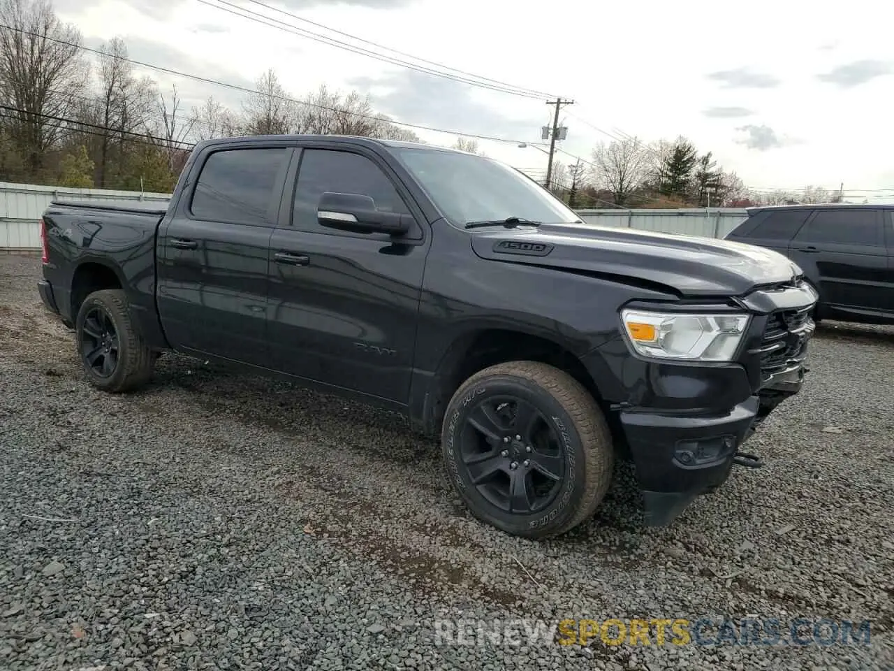 4 Photograph of a damaged car 1C6RRFFGXKN760650 RAM 1500 2019