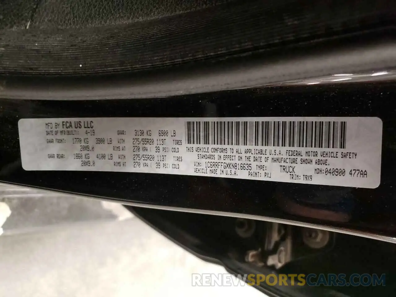 14 Photograph of a damaged car 1C6RRFFGXKN816635 RAM 1500 2019