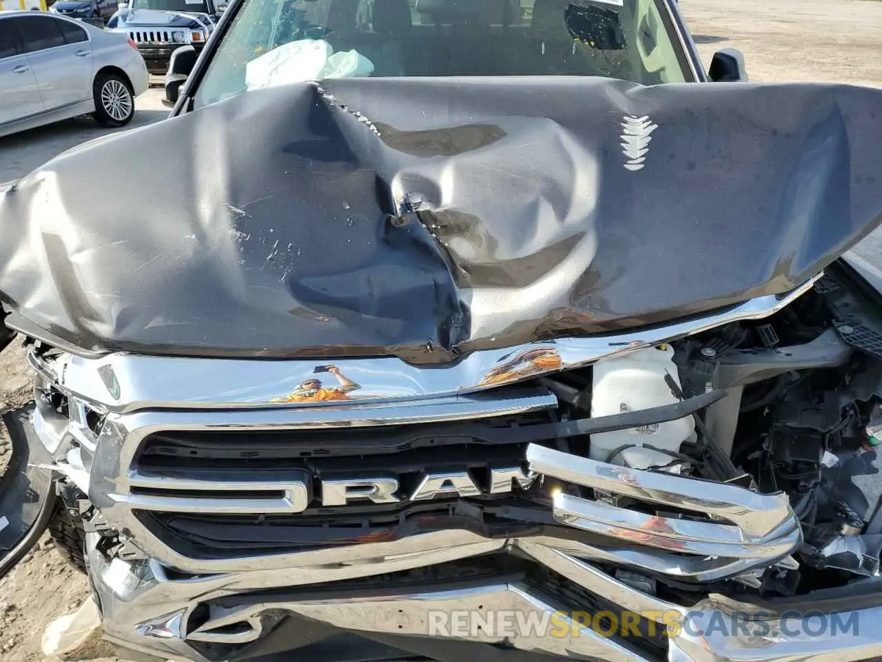 11 Photograph of a damaged car 1C6RRFFGXKN917335 RAM 1500 2019
