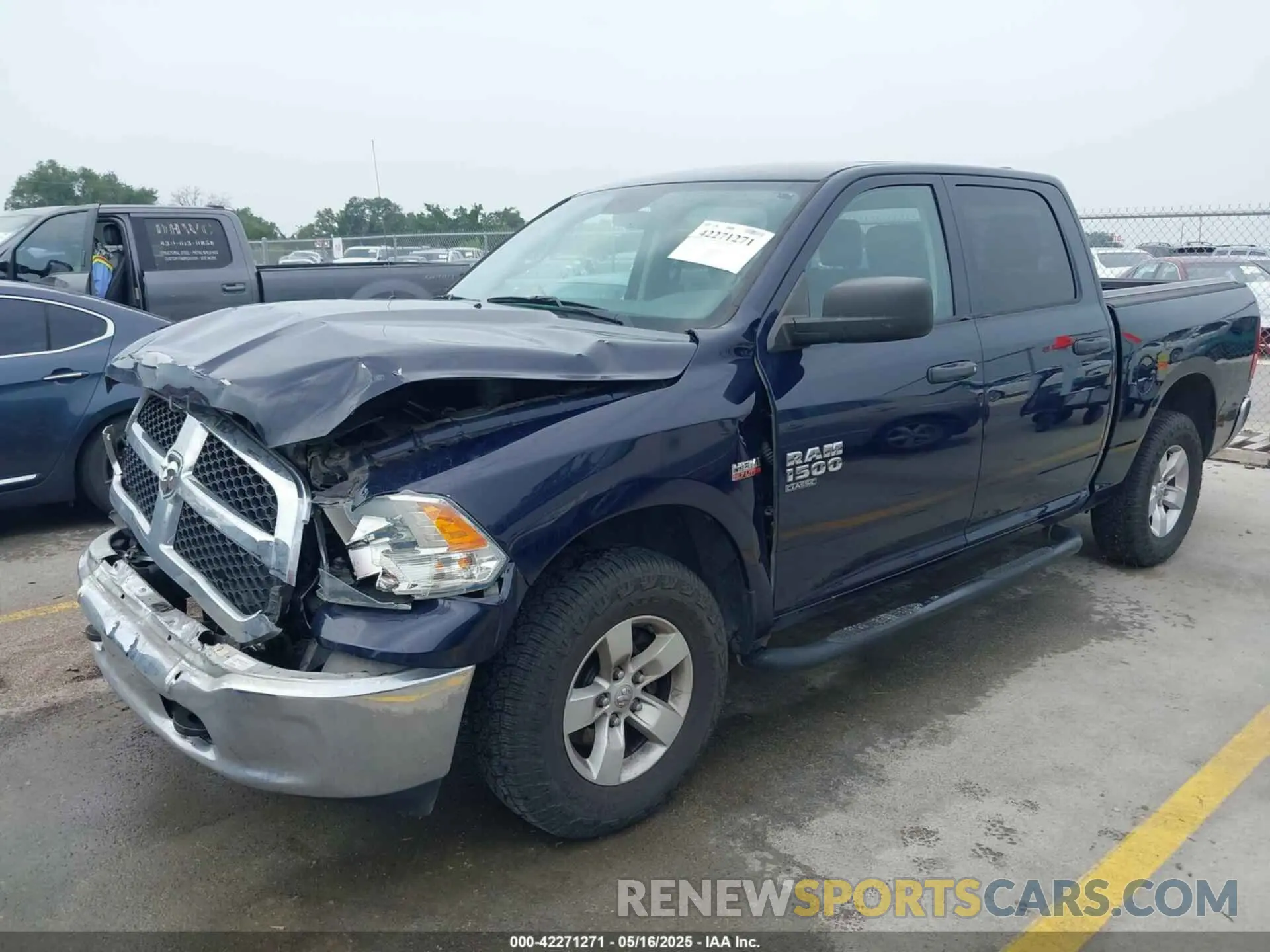2 Photograph of a damaged car 1C6RRFKT8KS532487 RAM 1500 2019