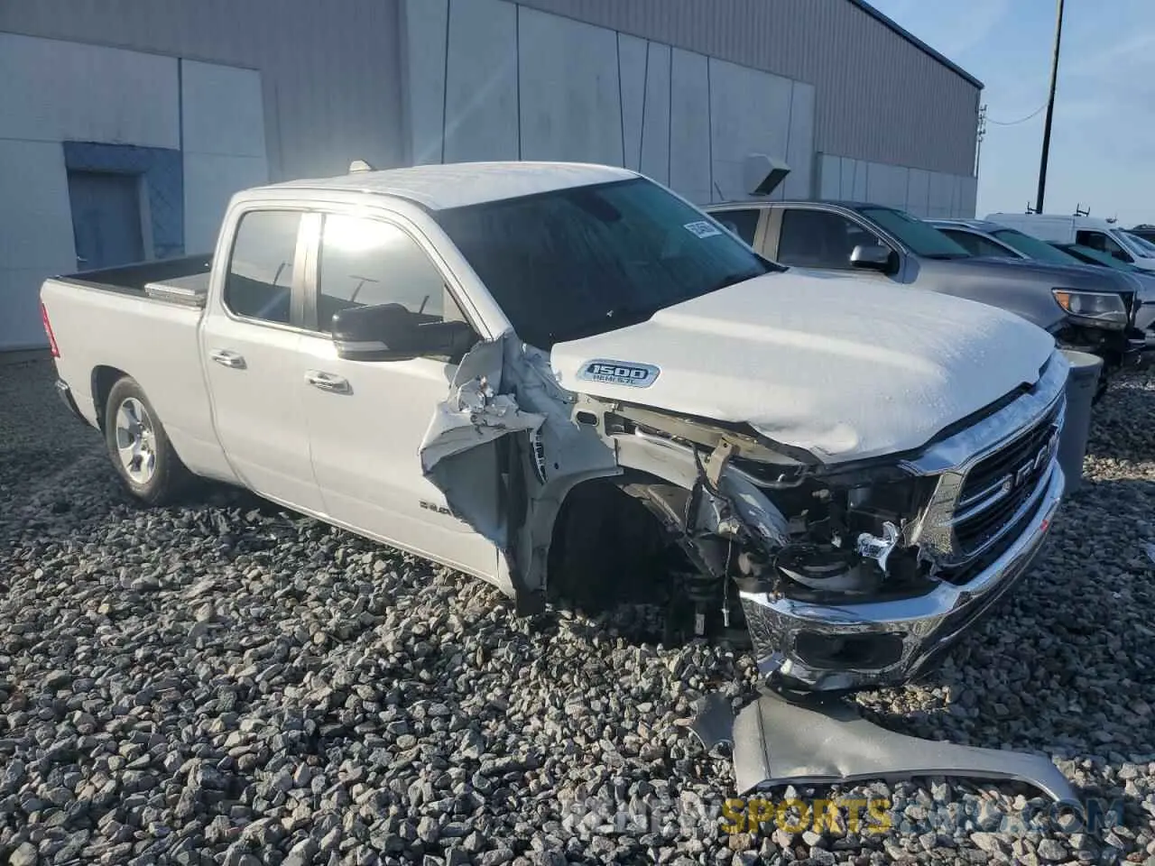 4 Photograph of a damaged car 1C6SRFBT8KN859892 RAM 1500 2019