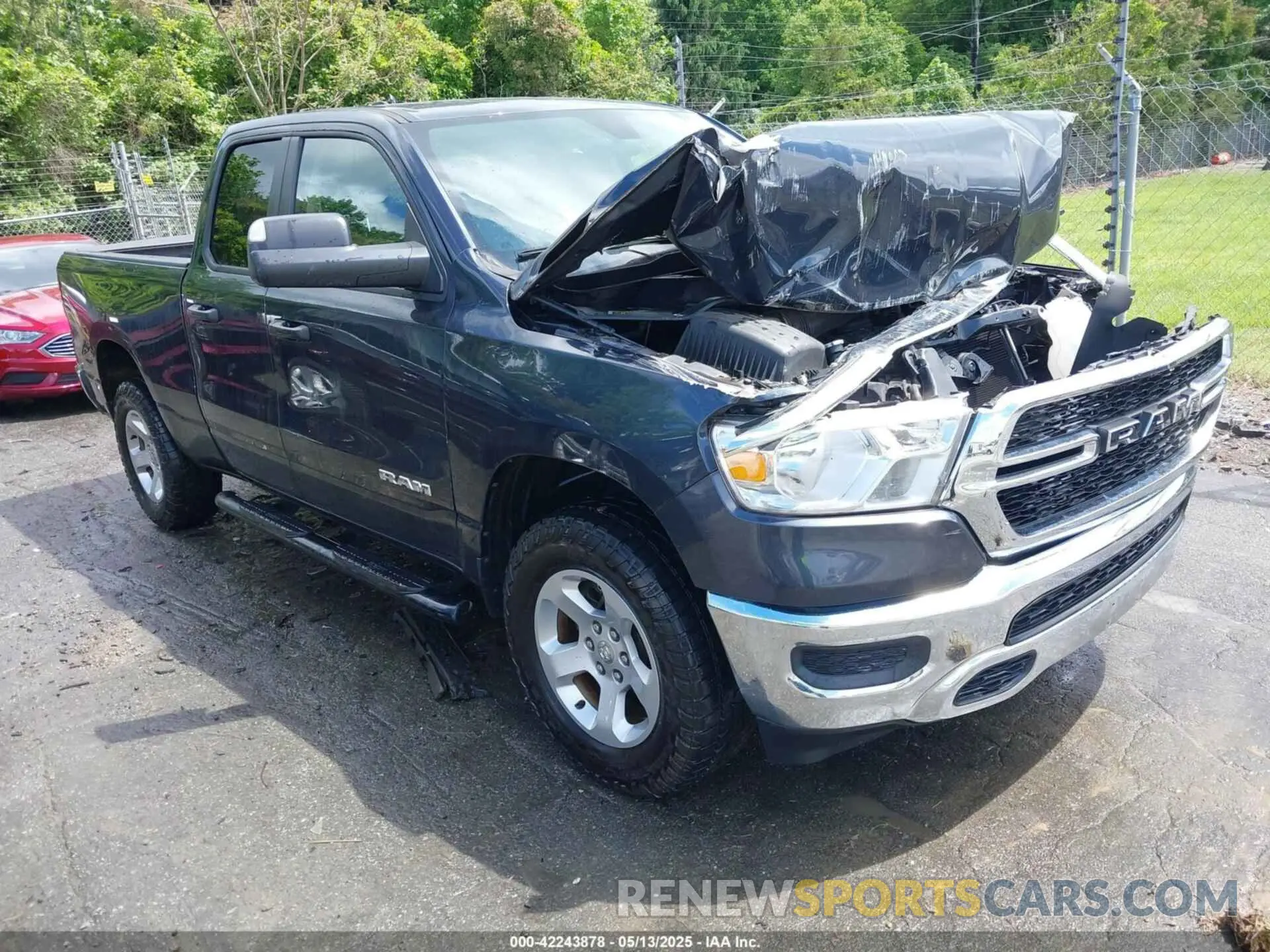 1 Photograph of a damaged car 1C6SRFCT5KN597618 RAM 1500 2019